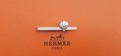Alfiler de corbata Hermès Vintage de plata Globo aerostático o concha marina
