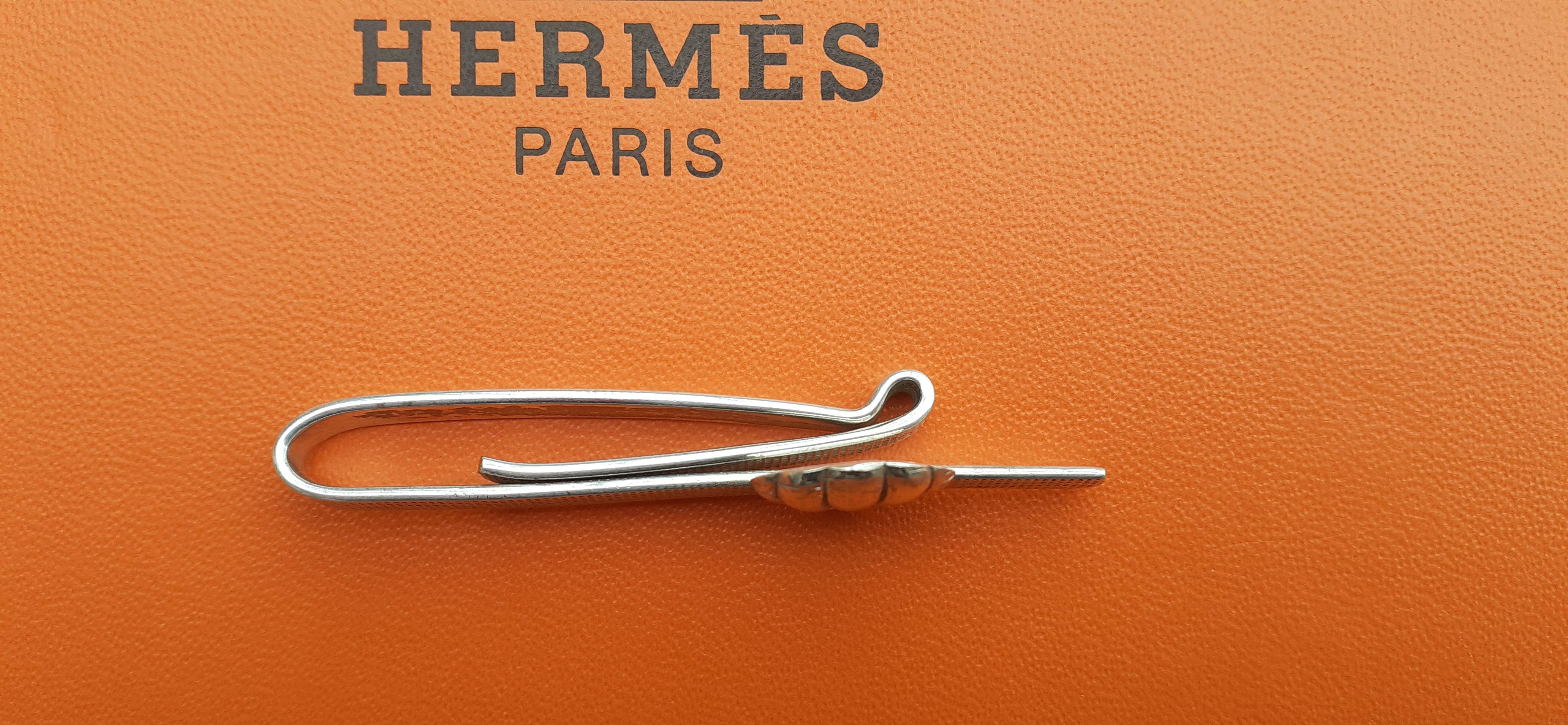 Clip de cravate vintage Hermès en argent Montgolfière ou coquillage Pour hommes en vente