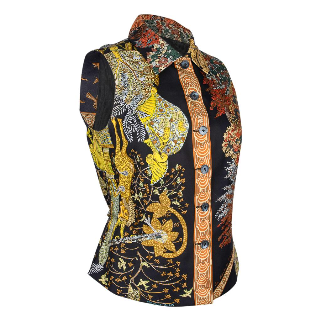 Guaranteed authentic Hermes Les Legendes De L'Arbre (Legend of the tree) silk scarf print vest. 
Black background and exquisite drawings.
6 black front buttons with collar.
2 slot pockets still sewn in.
Rear has elasticized adjustable waist with 2