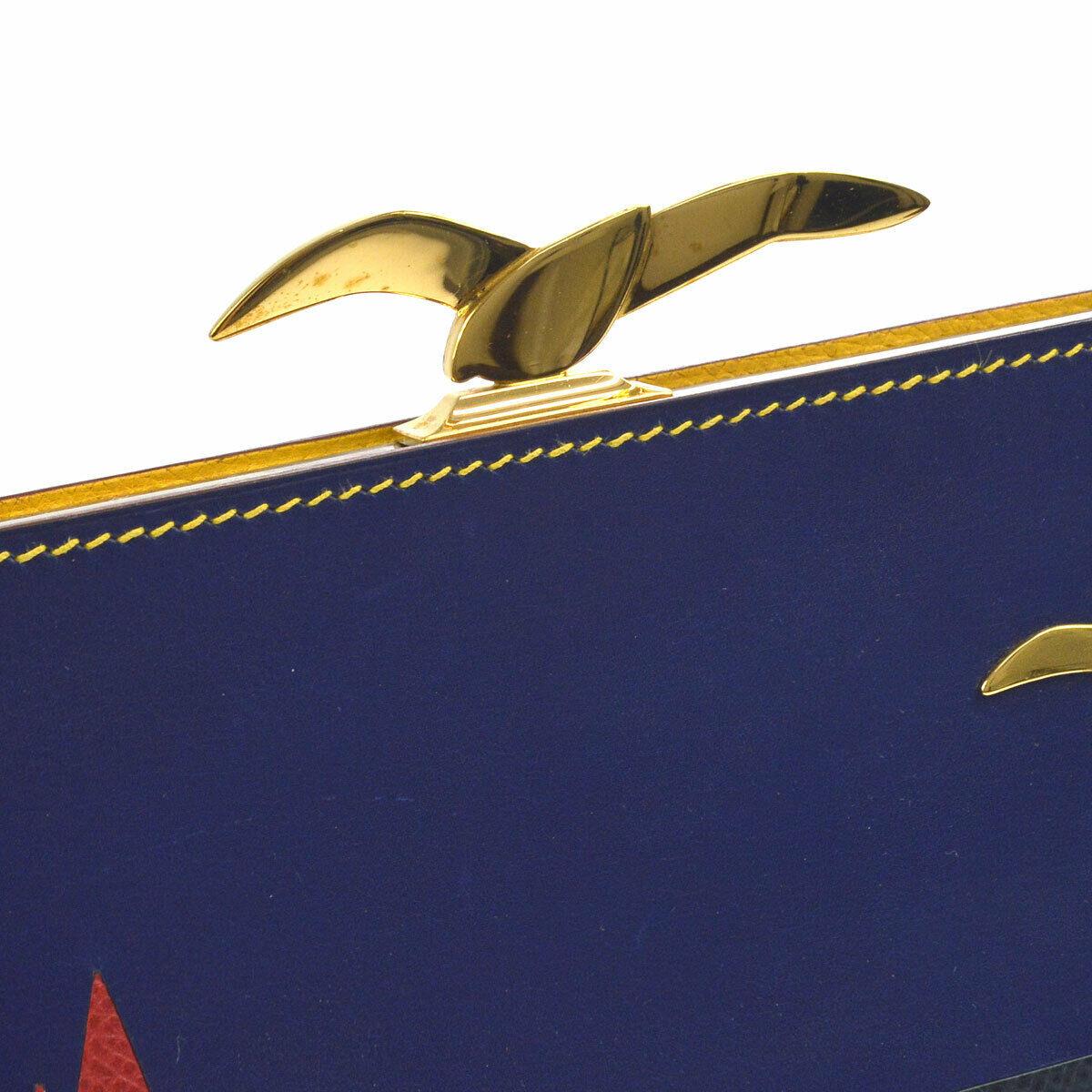 Hermes Vintage Yellow Blue Black Leather Boat Bird Gold Sac Malice Clutch Shoulder in Box

Leather
Gold tone hardware
Kisslock closure
Leather lining
Date code present
Made in France 
Shoulder strap drop 17