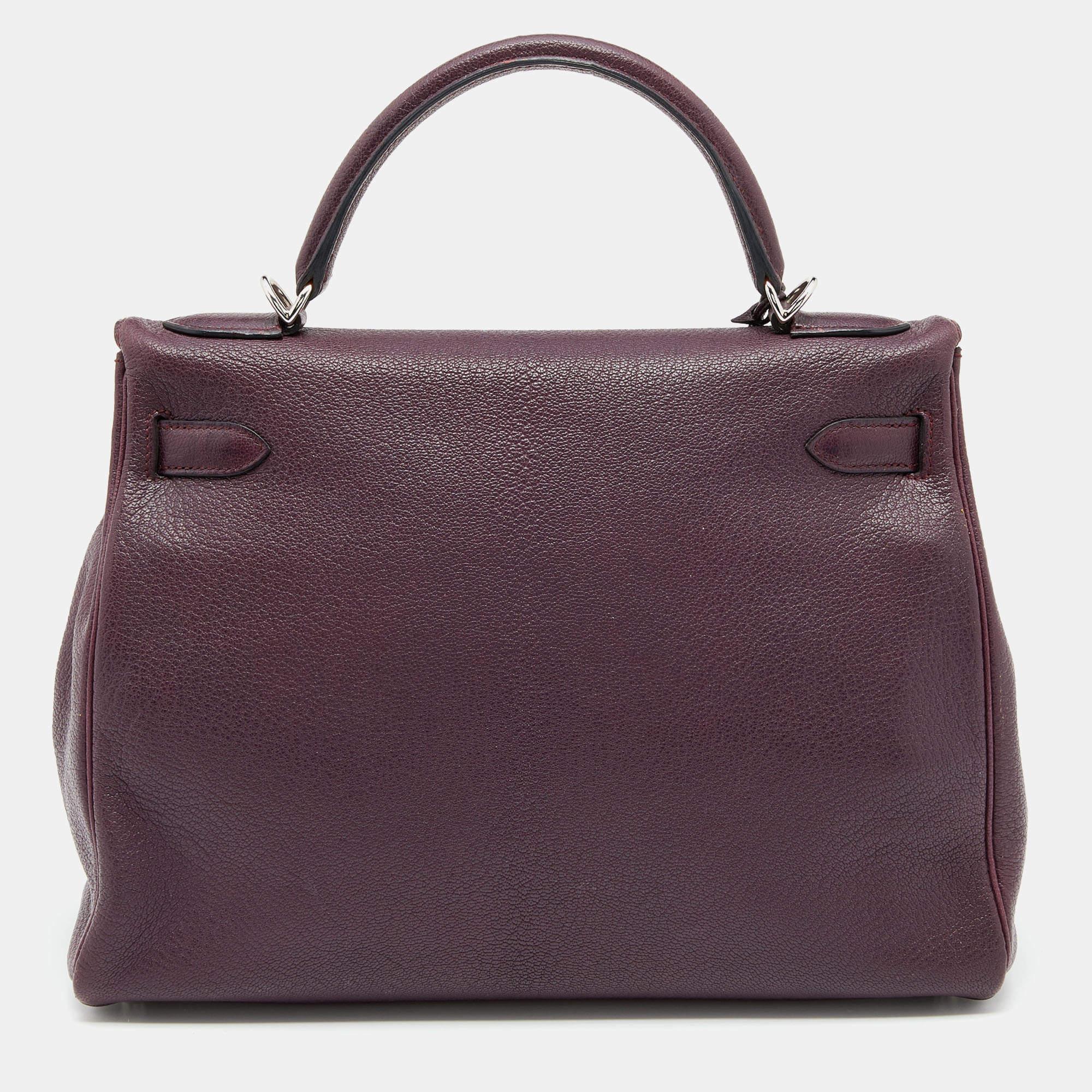 The Hermes Kelly is beautiful as it is carefully hand-stitched to perfection. This Violet Kelly Retourne 32 is crafted from Chevre de Coromandel leather and has palladium-plated hardware. The bag comes with a turn-lock closure, a single top rolled