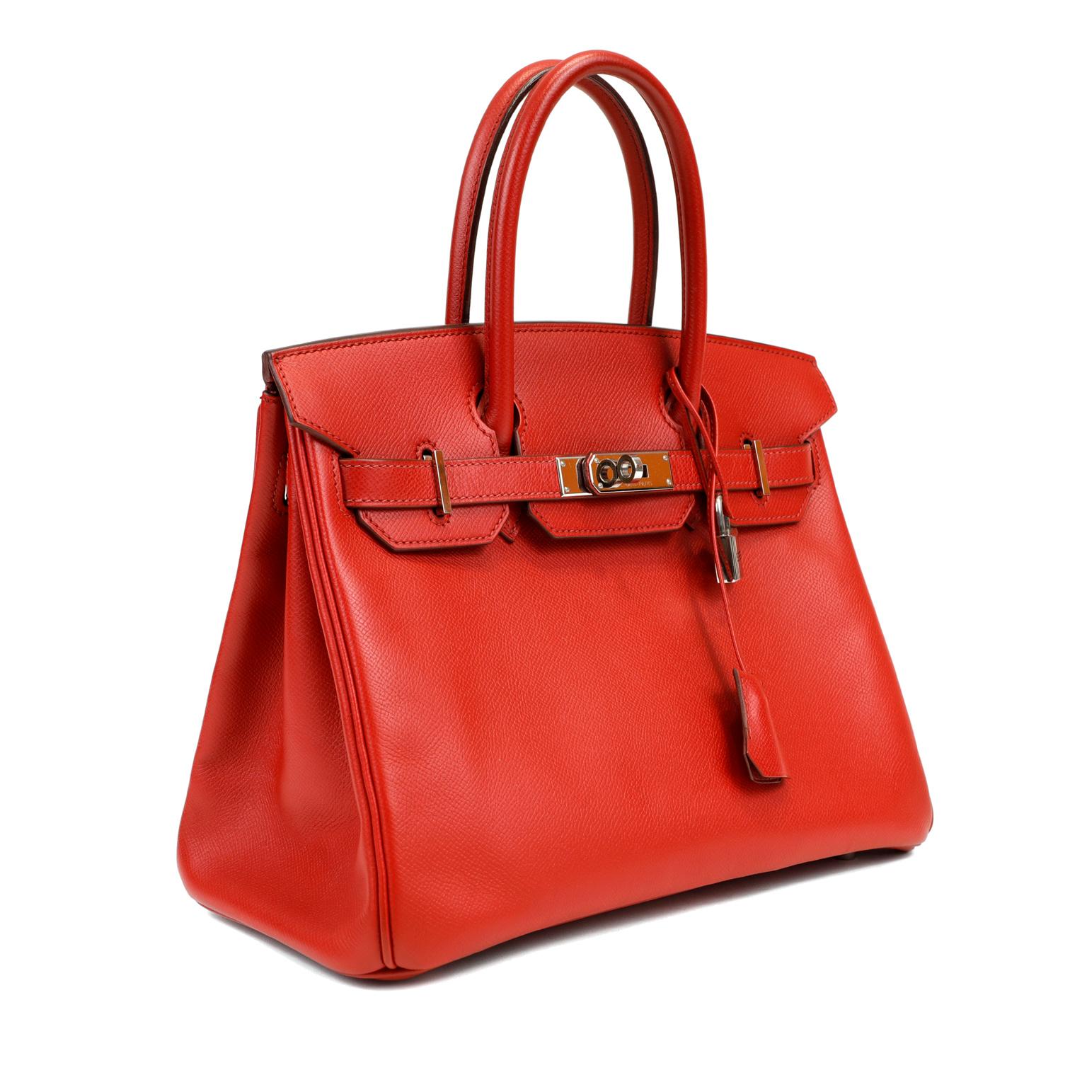 This authentic Hermès Vivid Red Epsom 30 cm Birkin is in excellent condition. Considered the ultimate luxury item, the Hermès Birkin is stitched by hand. Waitlists are commonplace and classic Rouge Casaque is always in high demand. 
Epsom leather is