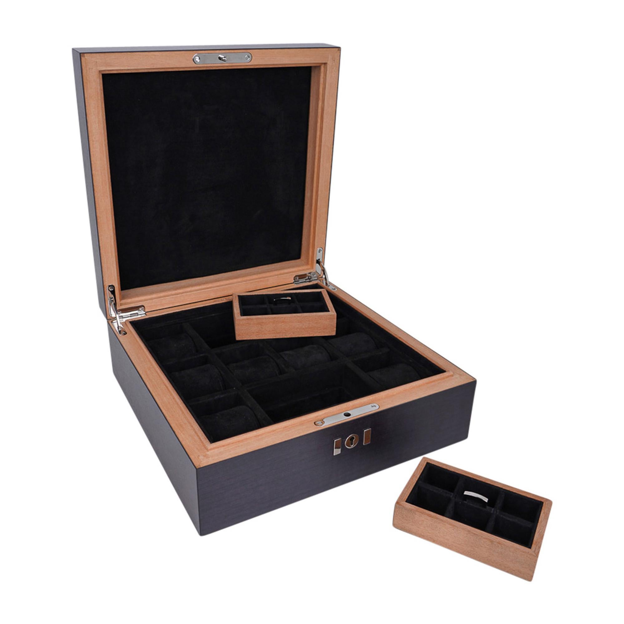 Mightychic offers an Hermes one of one Watch Box featured with matte Alligator
Vert Titien lid.
Rich Sycamore wood case lined in rich brown suede.
Holds eleven (11) watches.
Two removable trays - each have six (6) for rings or cuff links.
A