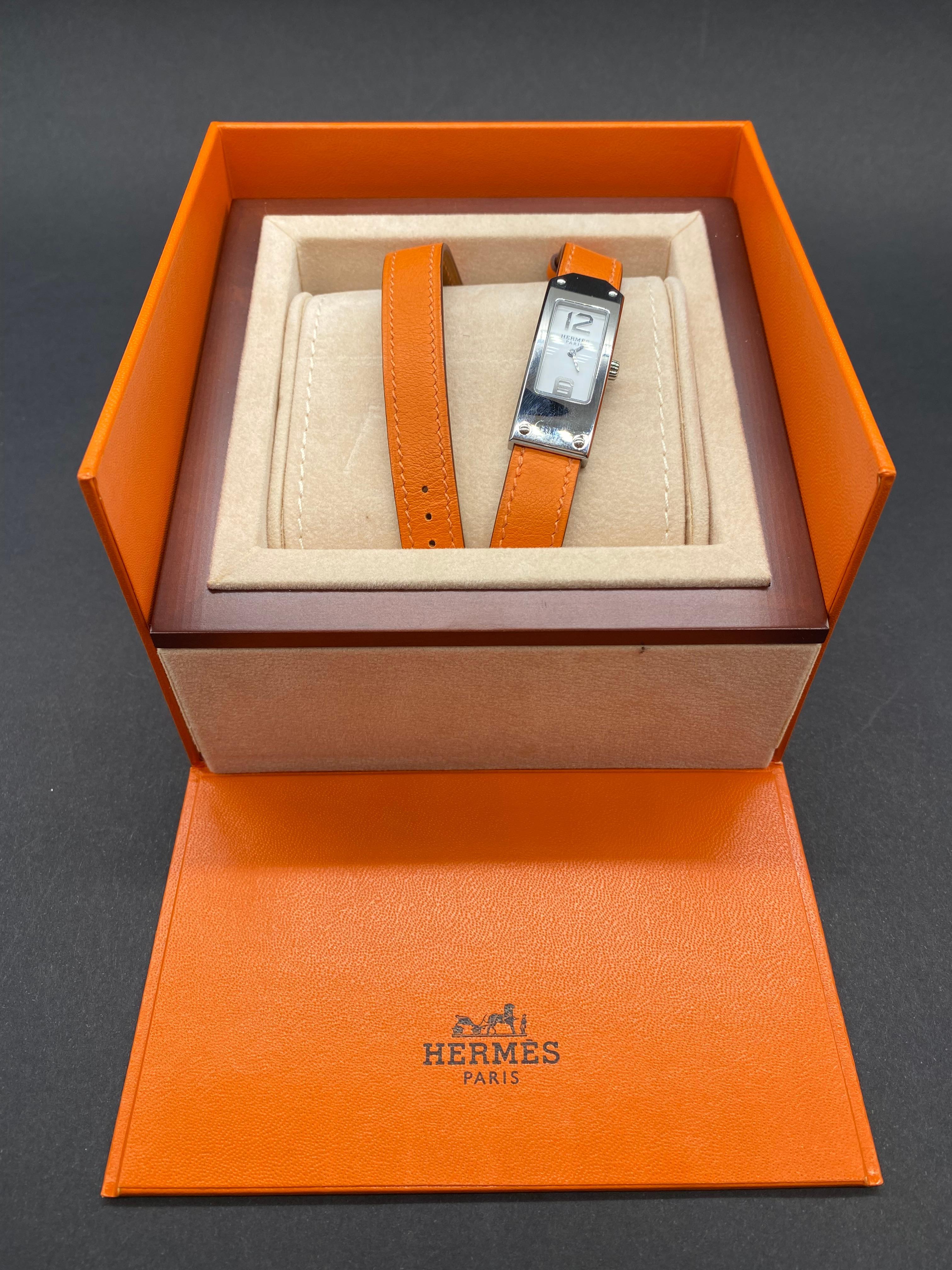 Hermes Watch, Kelly 2
Women’s bracelet watch in steel, white dial with applied Arabic numerals, stylized bezel. Quartz movement. Double row leather strap with steel pin buckle. 
Signed and numbered KT1.210 - 2902043.
As good as New 
Do not hesitate