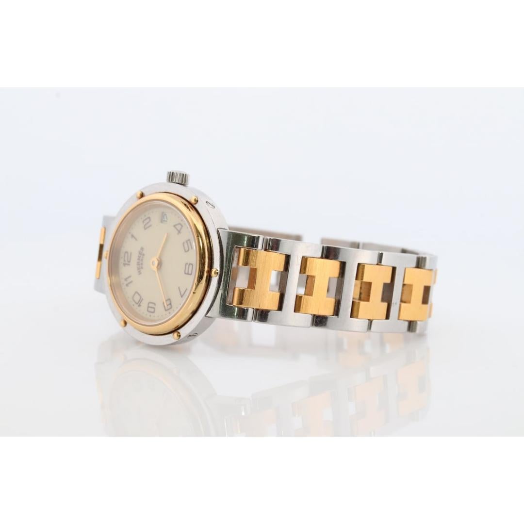 Vintage from the 1990s
Band Material: Stainless steel
Materials: Stainless steel
Power: Battery
Readout: Analog
Style: Minimalist
Very nice watch from Maison HERMES, small model Clipper, palladium steel and gold plated. This watch has a quartz