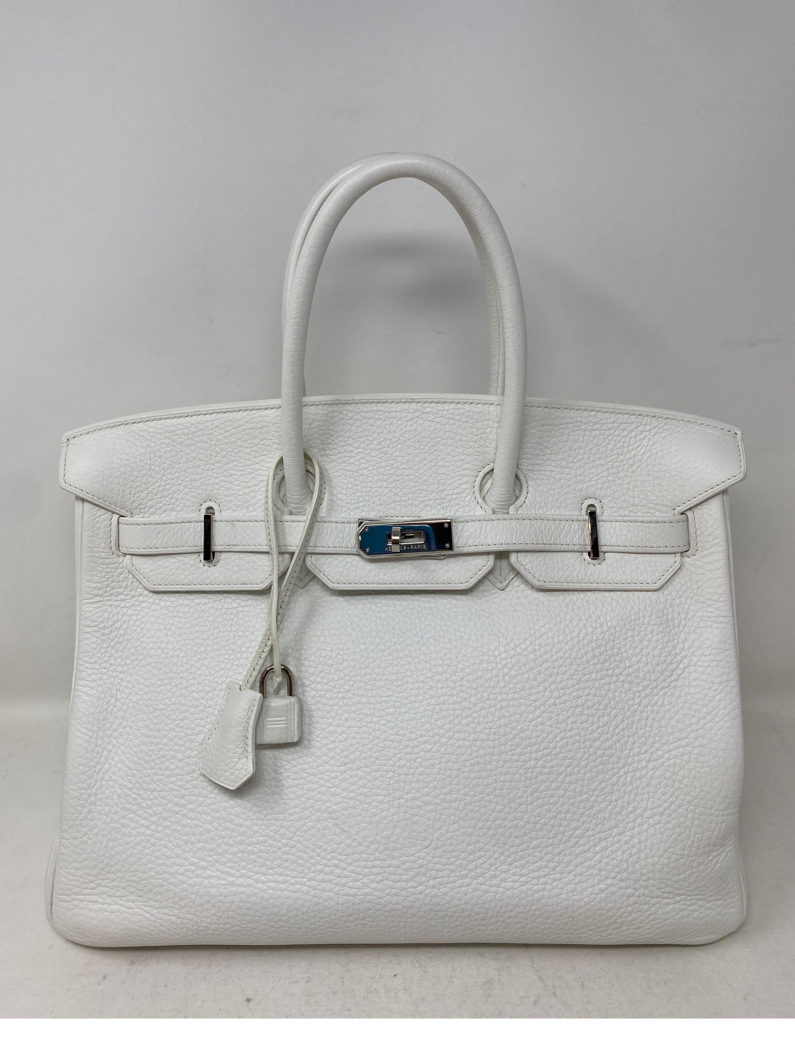 Hermes White Birkin Bag. Stunning rare white clemence leather. Palladium hardware. Good condition. Includes clochette, lock, keys, and dust cover. Guaranteed authentic. 
