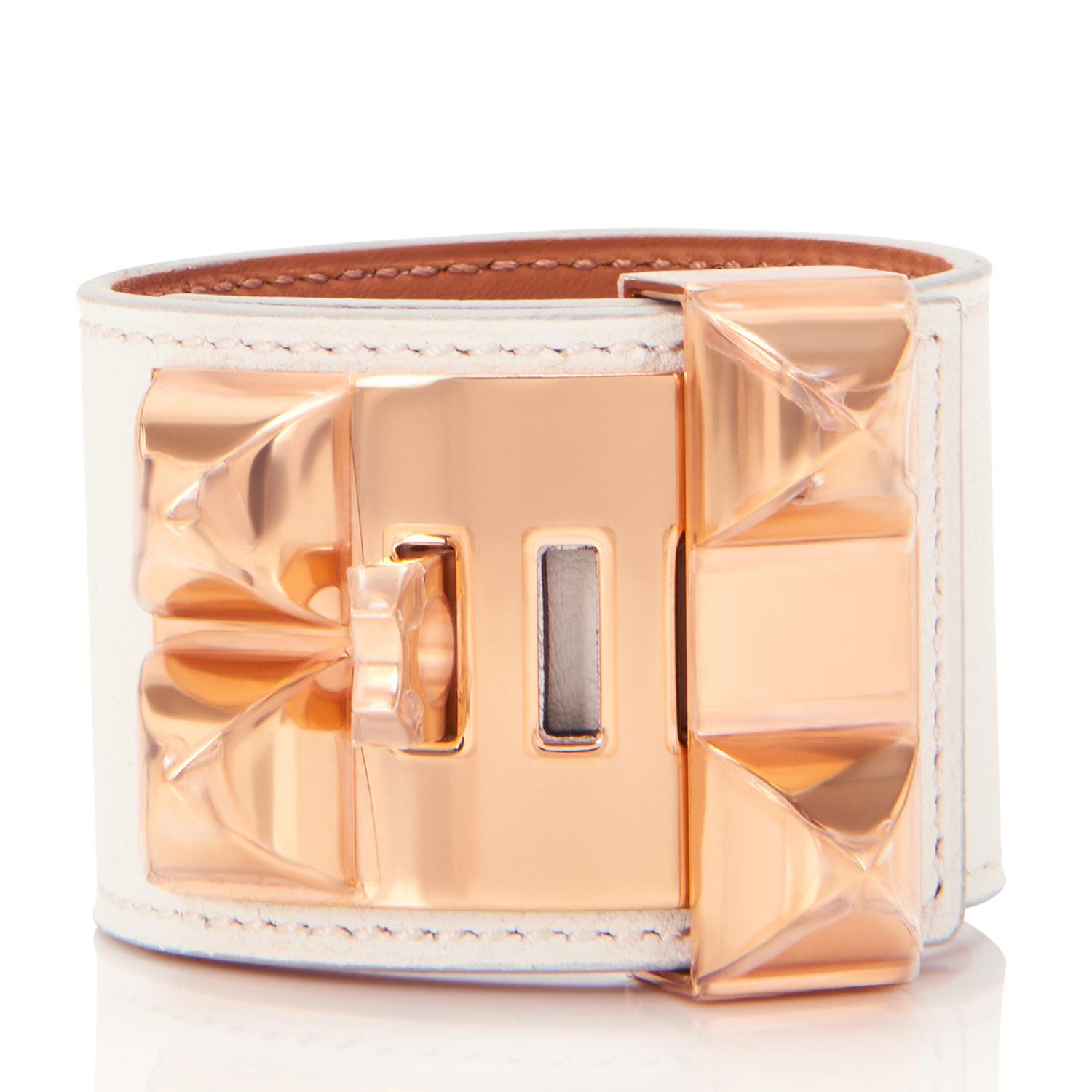 Hermes White Collier de Chien CDC Cuff Bracelet in Swift Leather with Rose Gold Hardware 
Sublime!  The ultimate bracelet from Hermes in the rarest White color!
White CDC with Rose Gold is extremely rare as it is rarely ever produced.
Brand new in