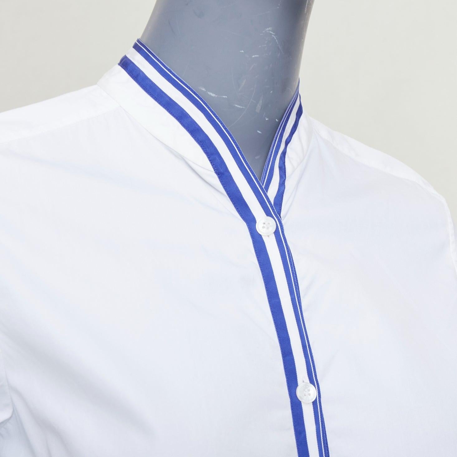 HERMES white blue 100% cotton nautical stripes short collar shirt FR34 XS
Reference: SNKO/A00597
Brand: Hermes
Material: Cotton
Color: White, Blue
Pattern: Striped
Closure: Button
Extra Details: Concealed buttons at cuffs.
Made in: