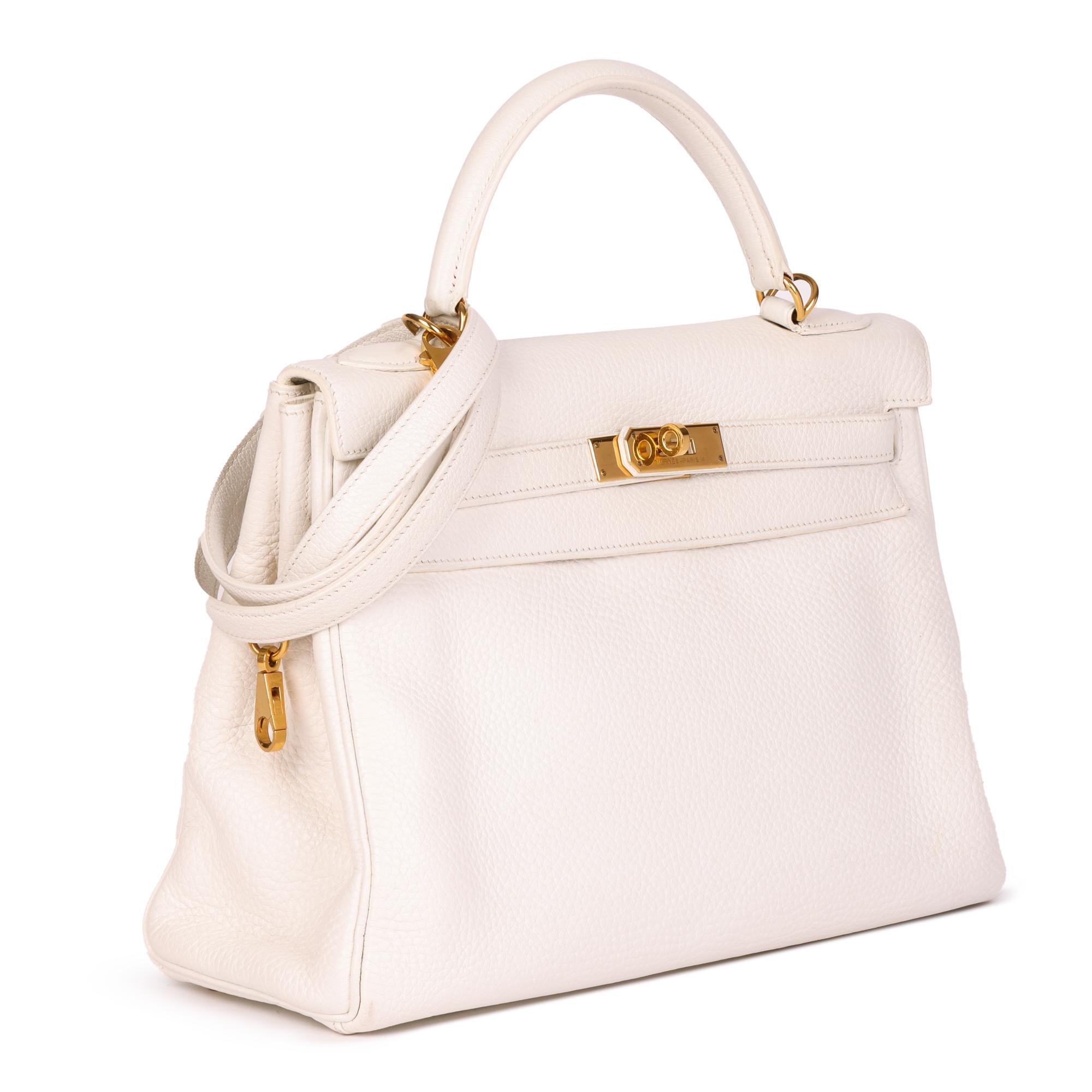 HERMÈS
White Clemence Leather Kelly 32cm Retourne

Serial Number: [H]
Age (Circa): 2004
Accompanied By: Hermès Dust Bag, Shoulder Strap, Raincover
Authenticity Details: Date Stamp (Made in France) 
Gender: Ladies
Type: Top Handle, Shoulder

Colour:
