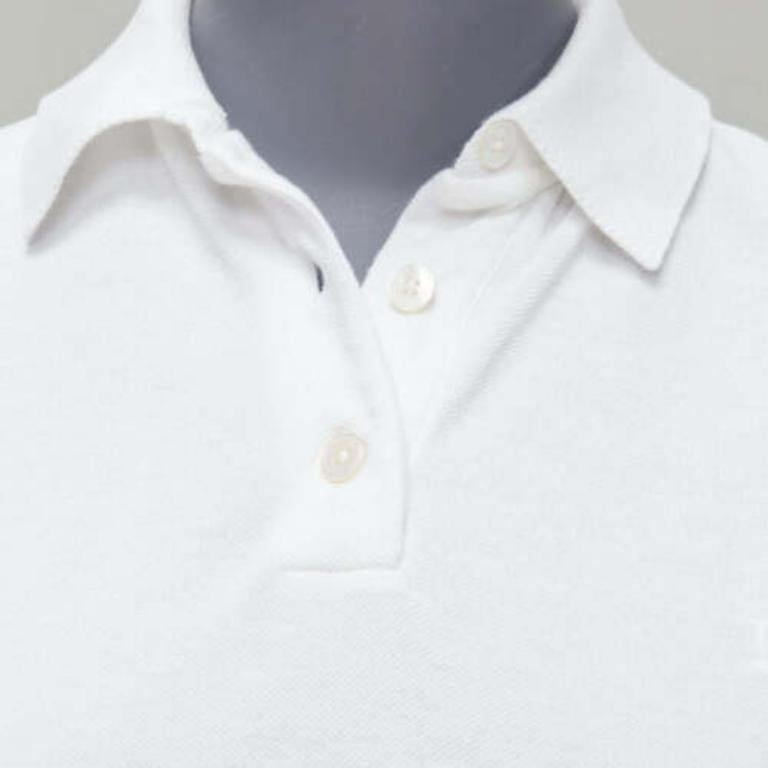 HERMES white cotton pique H embroidered logo slim fit polo shirt S
Reference: JACG/A00118
Brand: Hermes
Material: Cotton
Color: White
Pattern: Solid
Closure: Button
Extra Details: Plain back.
Made in: Italy

CONDITION:
Condition: Excellent, this