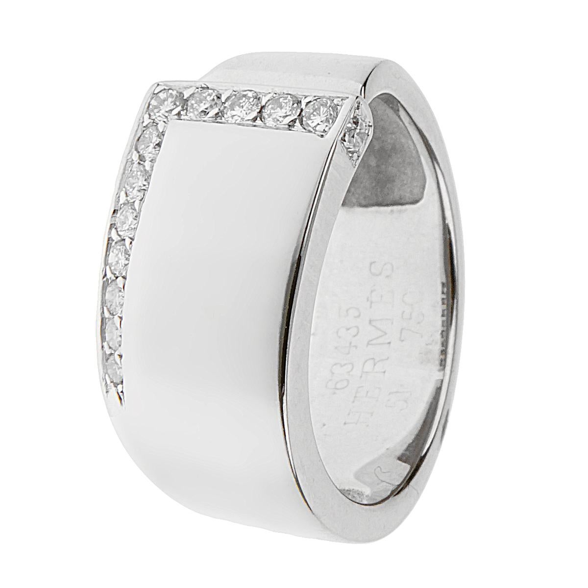 A fabulous Hermes diamond cocktail ring showcasing an open motif band design adorned with the finest original Hermes round brilliant cut diamonds in shimmering 18k white gold. The ring measures a size 6 and can be resized if needed.
