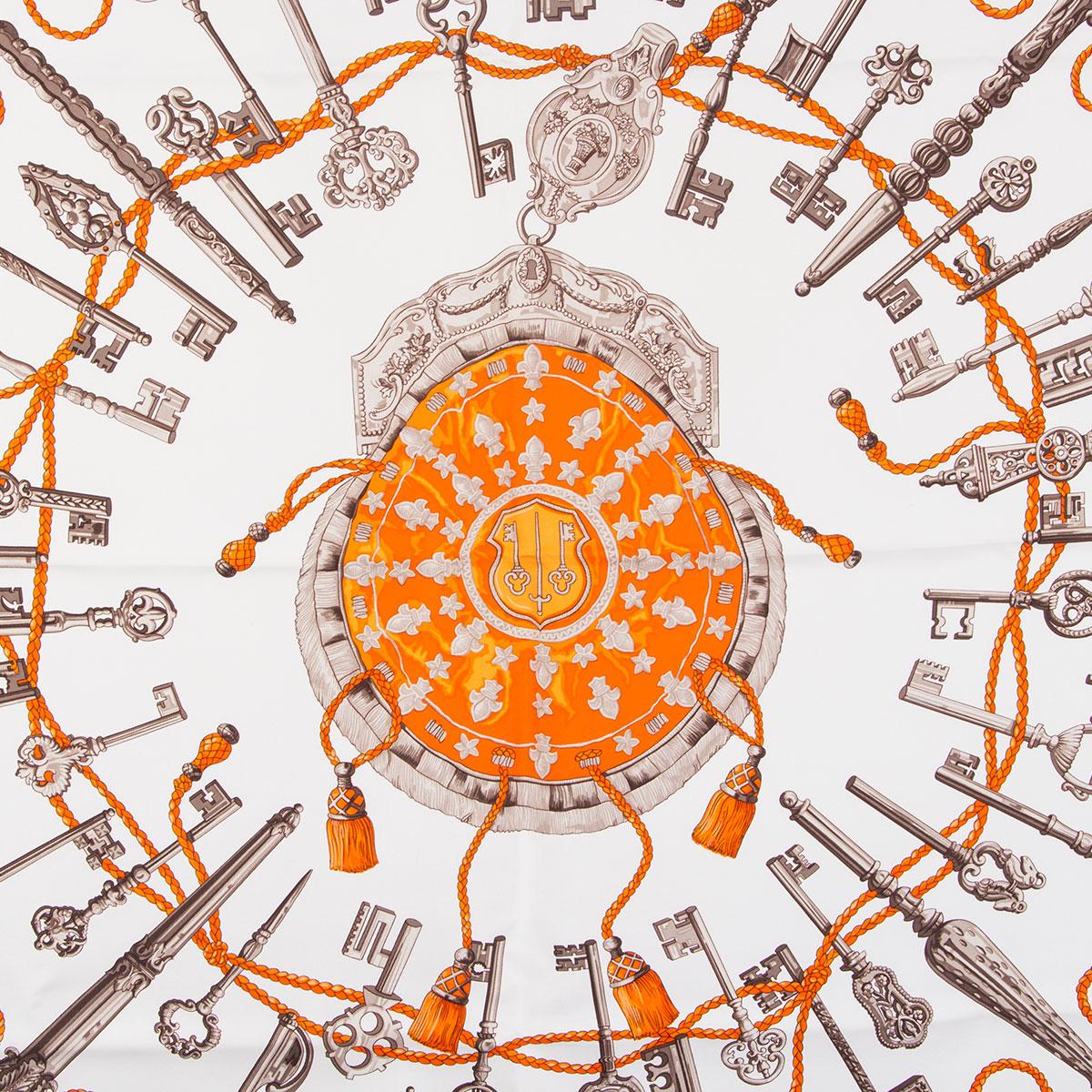 Hermes 'Les Cles 90' scarf by Caty Latham in white silk twill (100%) with details in orange and grey. Has been worn and is in excellent condition.

Width 90cm (35.1in)
Height 90cm (35.1in)