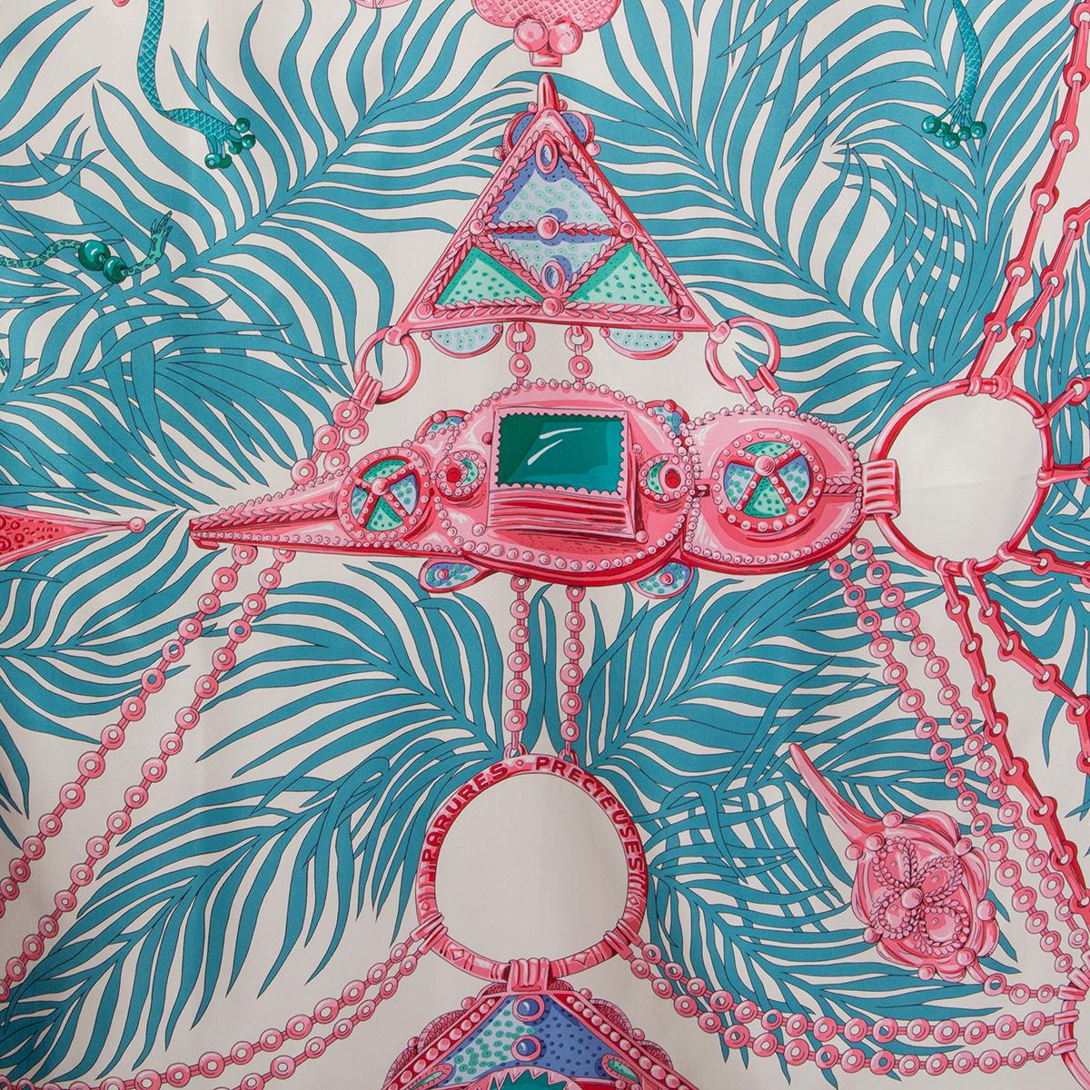 100% authentic Hermès Parures Precieuses 140 in green and off-white light weight silk (100%) with details in pink, red, petrol, turquoise and blue silk. Has been worn and is in excellent condition.

Issue spring/summer 2017

Measurements
Width	140cm