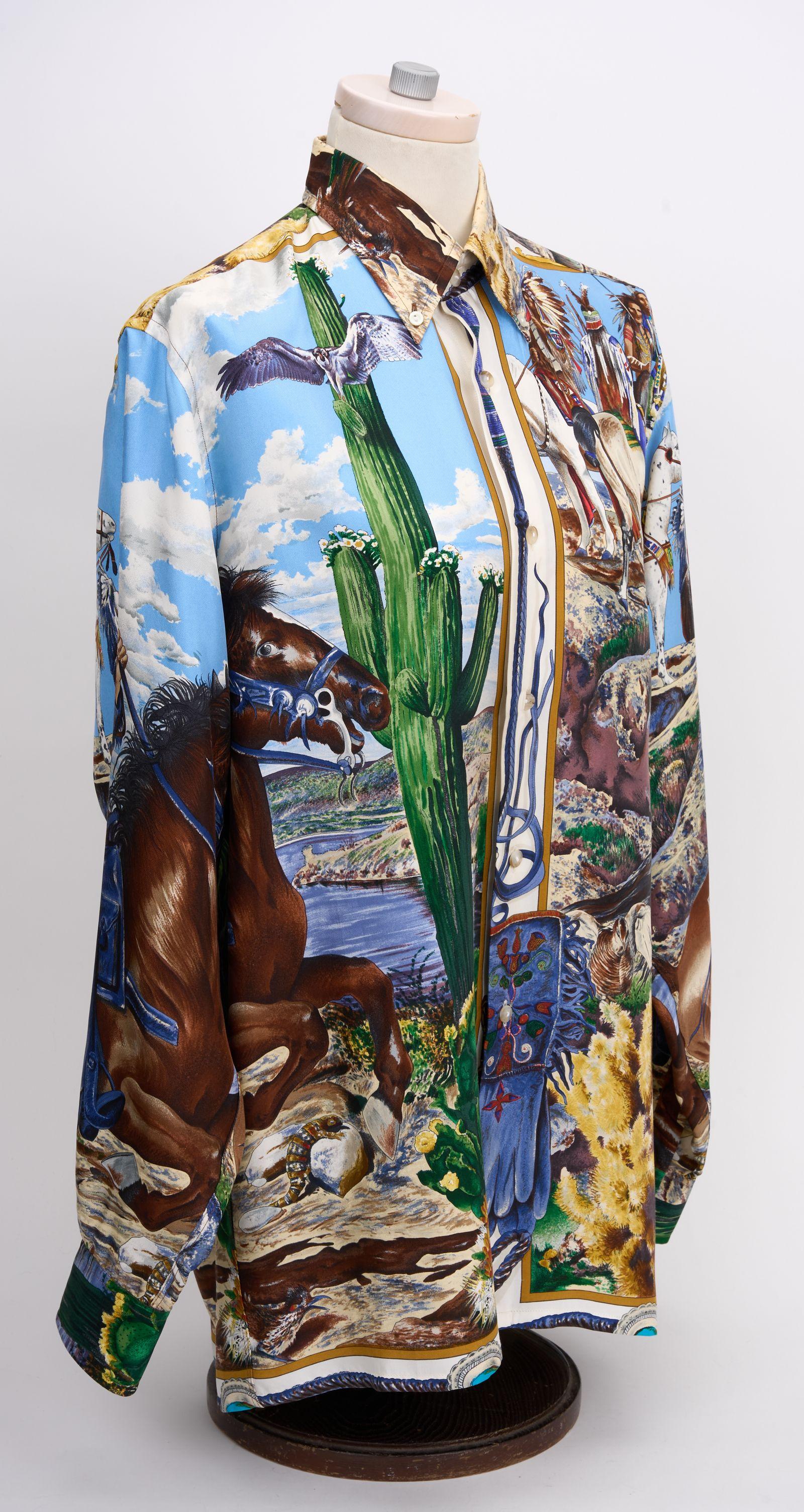 This beautiful Hermès 100% silk button down is a classic piece to compliment any wardrobe. Features the rare Pony Express print designed by world renowned Texas native Kermit Oliver. French Size 38, us size 6/8
Please refer to measurements