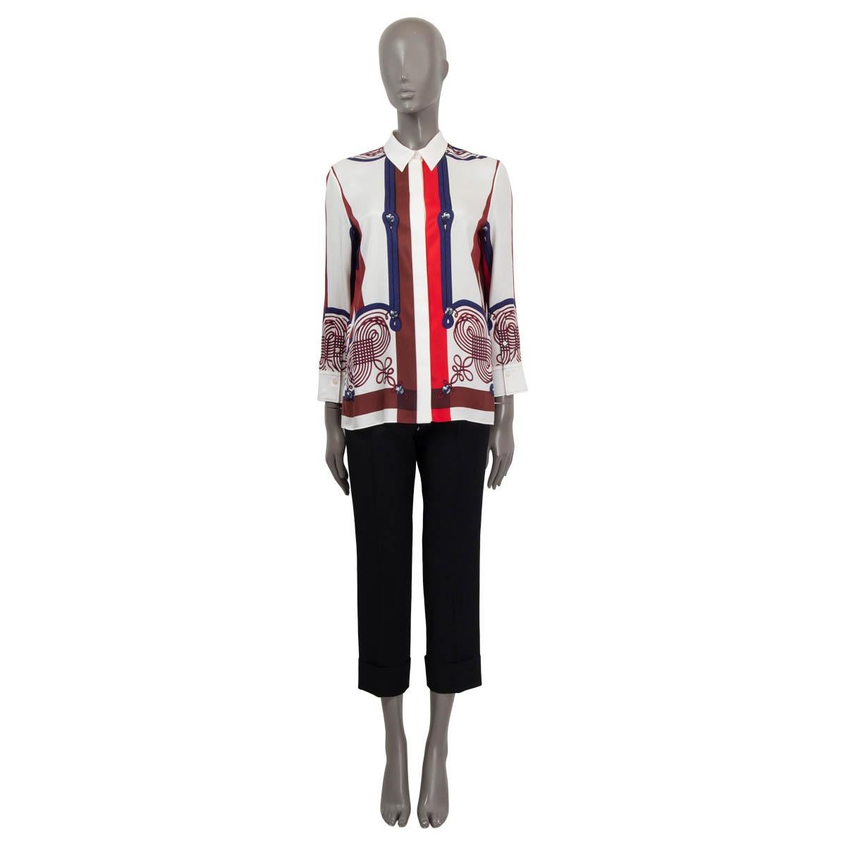 100% authentic Hermès Resort 2019 Brandebourgs Encoder button-up shirt in off-white, red, burgundy, blue and brown silk (100%). Features long sleeves and buttoned cuffs. Opens with concealed buttons on the front. Unlined. Has been worn once and is