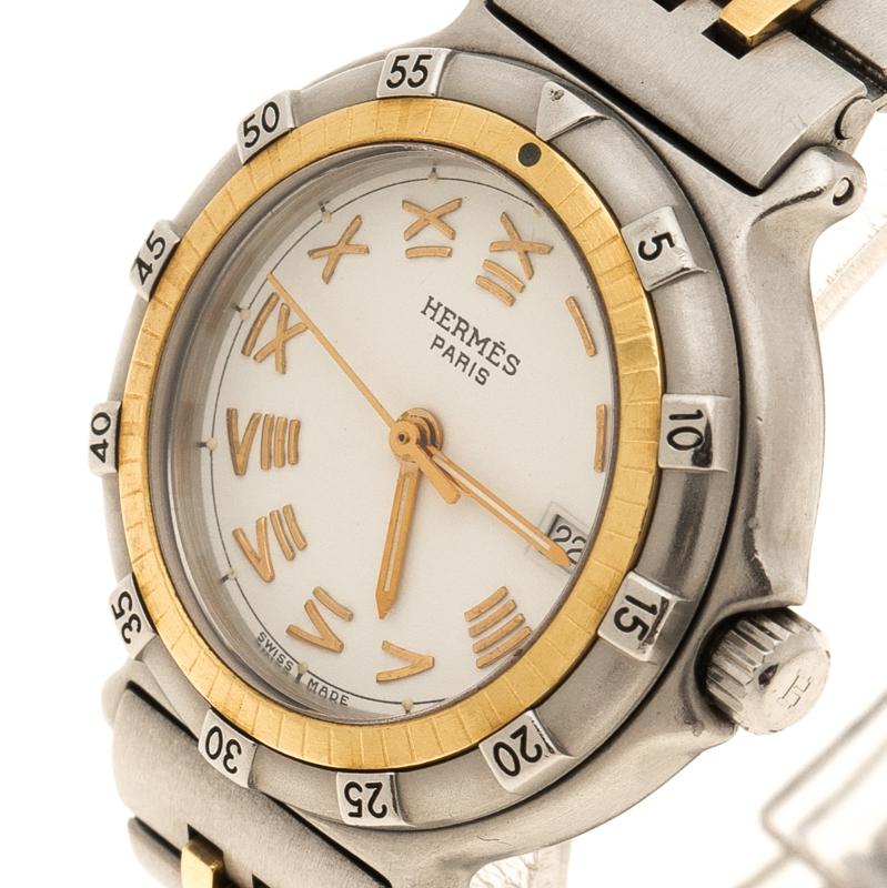 Hermes’ Captain Nemo watch is a gorgeous creation! Designed with impeccable details, Captain Nemo comes with a stainless steel case, an outer unidirectional bezel with minute Arabic markers and inner gold tone striated bezel. Its white dial is