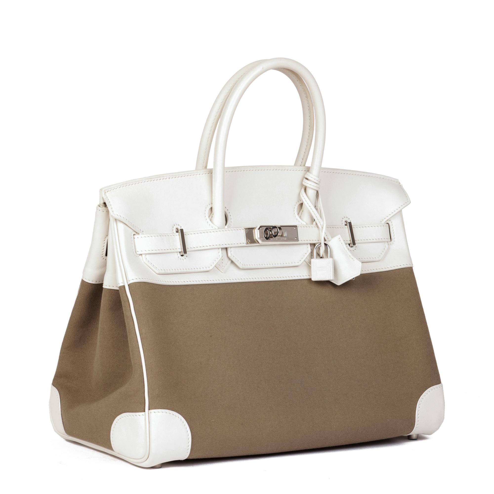 Hermès White Swift Leather & Olive Toile Canvas Birkin 35cm Retourne

Product Details
Xupes Ref: JJLG108
Brand: Hermès
Model: Birkin 35cm
Type: Tote
Serial Number: [M]
Age: 2009
Accompanied By: Hermès Dust Bag, Padlock, Keys, Clochette, Care