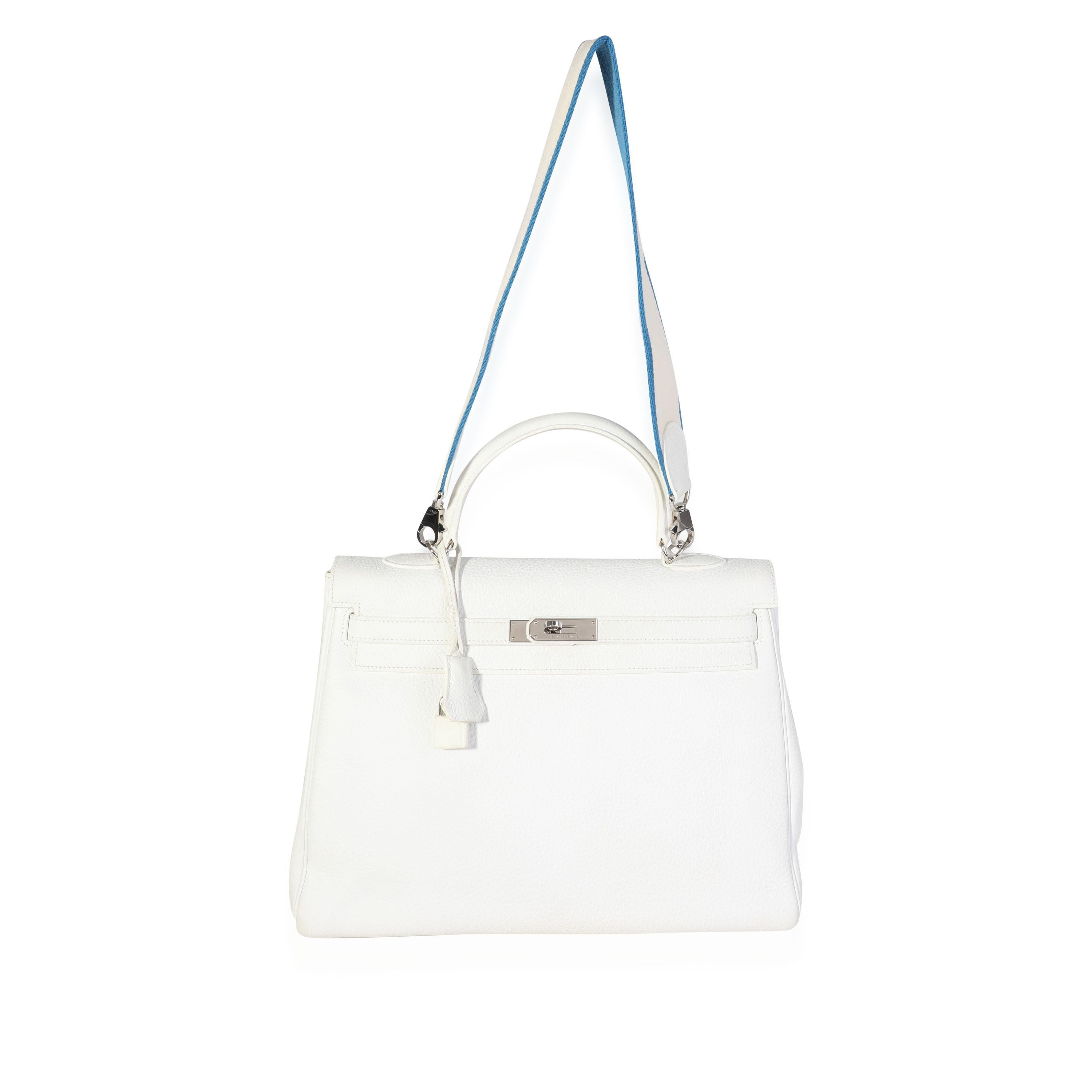 Listing Title: Hermès White Togo Retourne Kelly 35
SKU: 119805

Handbag Condition: Very Good
Condition Comments: Very Good Condition. Scuffing to corners. Discoloration throughout leather. Scratching to hardware. Scuffing and discoloration to lock.