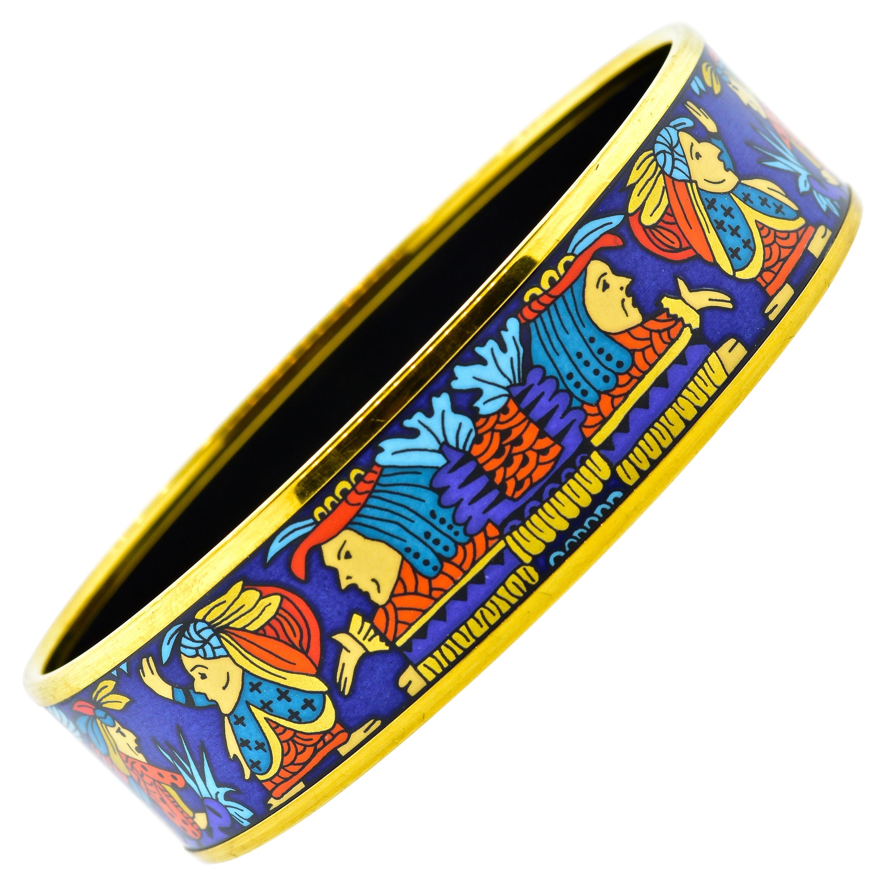 Hermes Paris enamel gold plated bangle bracelet, size wide.  Multi color enamel, this wide statement is .87 inches wide.  The circumference is 7.5. This vintage Hermes Paris piece is in excellent condition.  It comes in a large wood presentation