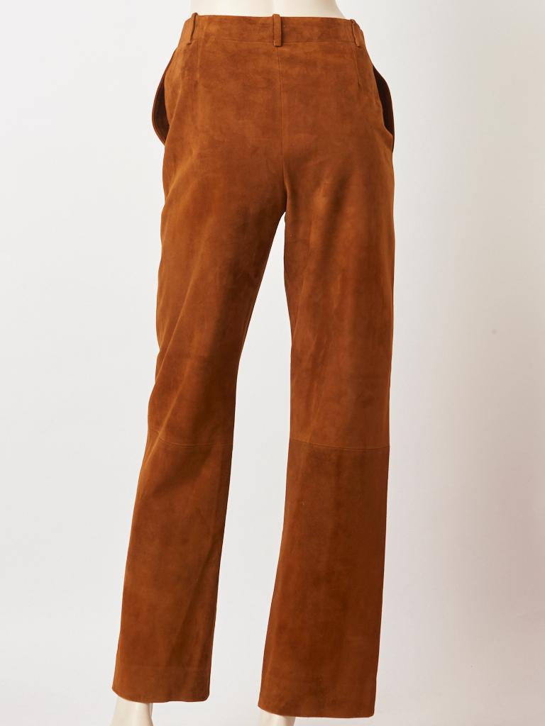 Hermes, rust tone, suede trouser having a wide, straight leg, side, slash pockets, flat fly front and belt loops.