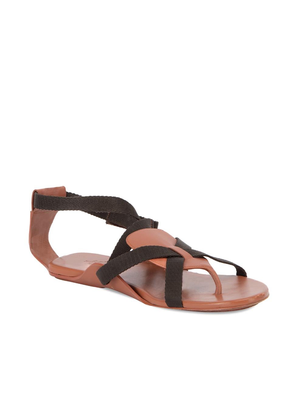 CONDITION is Very good. Minimal wear to sandals is evident. Minimal wear to and scuffs to the leather at the toe point which has started to come off on this used Hermès designer resale item. This item comes with original dustbags.  Details  Brown