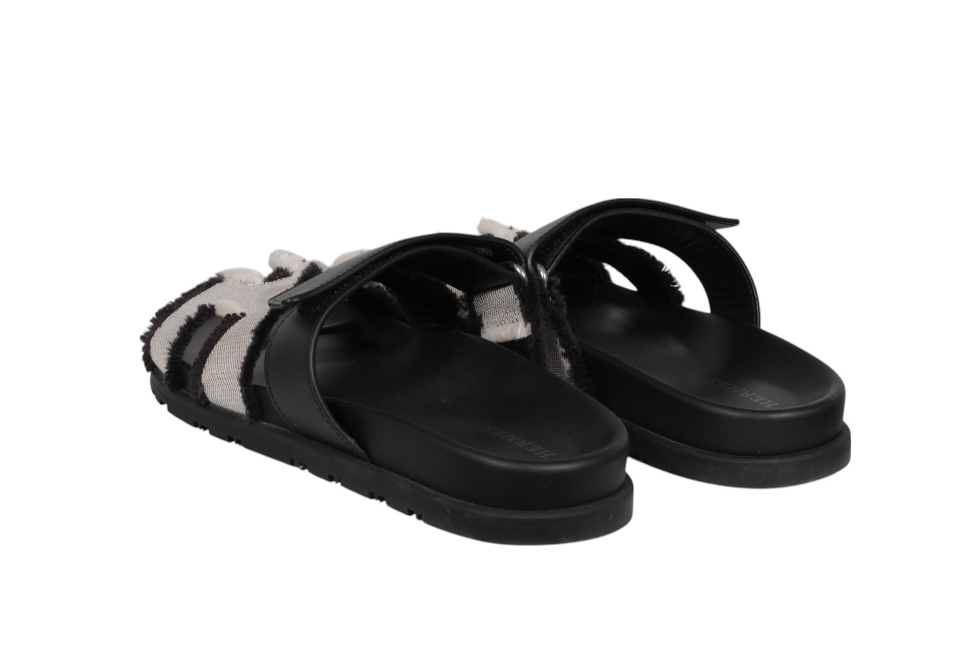 Hermes Womens Chypre Sandal Size US 7 EU 37 Fringed Prunoir Black Grey Tan Pour femmes en vente