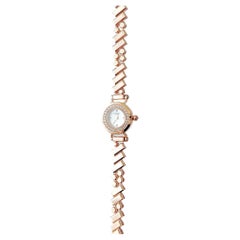 Montre Faubourg Polka d'Hermès pour femme en or rose et diamants, mini modèle, 15,5 m