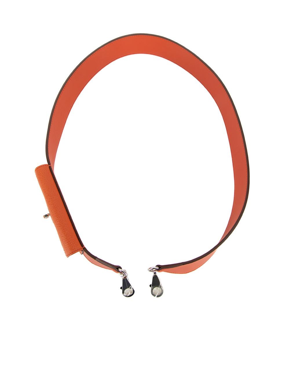 CONDITION is Never Worn. No visible wear to bag strap is evident on this used Hermès designer resale item. This item includes the original dustbag and box.  Details  Classic orange Leather Bag strap Kelly pocket Turnlock closure Silver lobster clasp