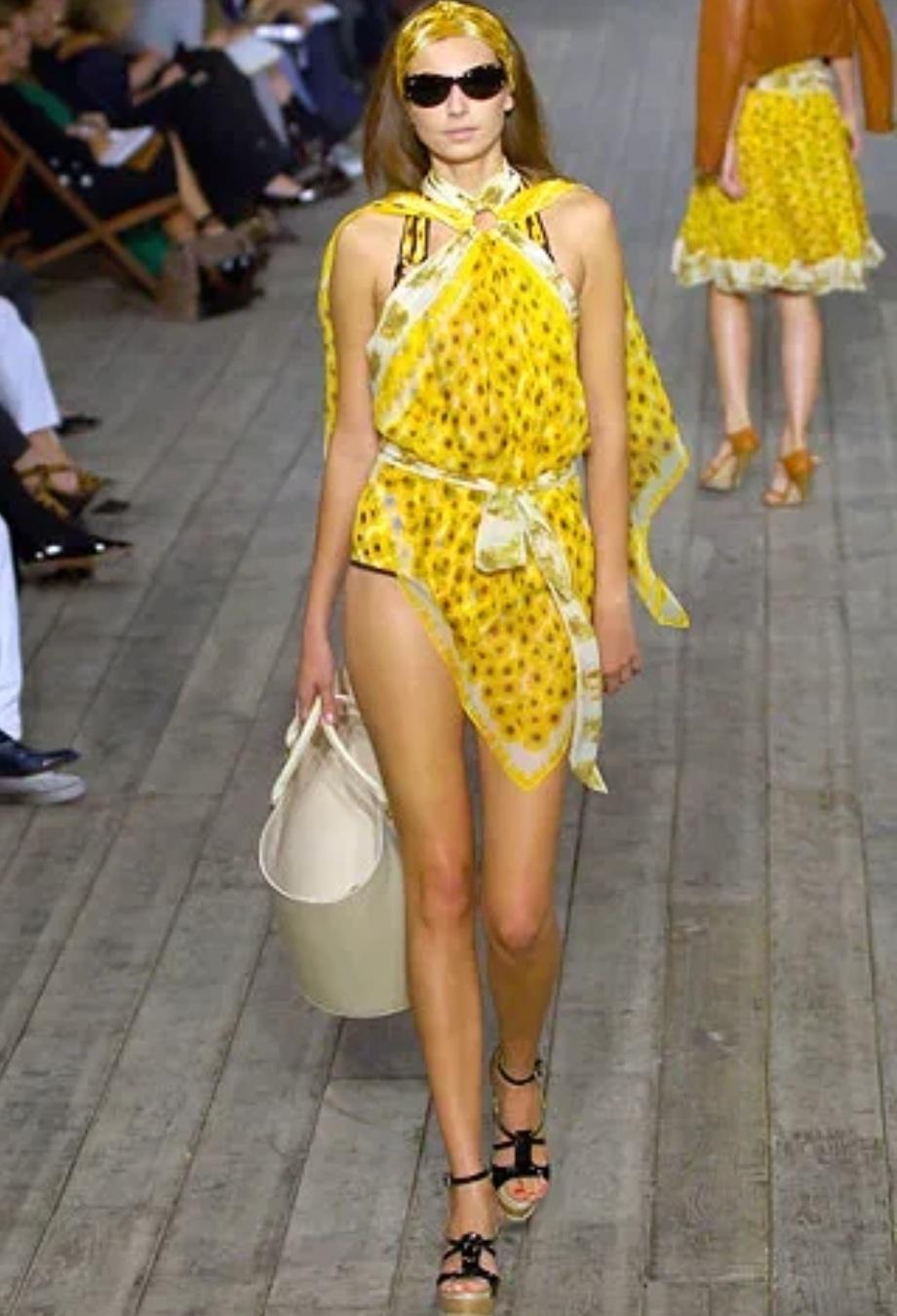 Hermès’ Spring/Summer 2007 collection under Jean Paul Gaultier captured the essence of effortless Parisian elegance, and this scarf top is one of our favourite pieces. The halterneck silhouette drapes beautifully over the body, cinched with a