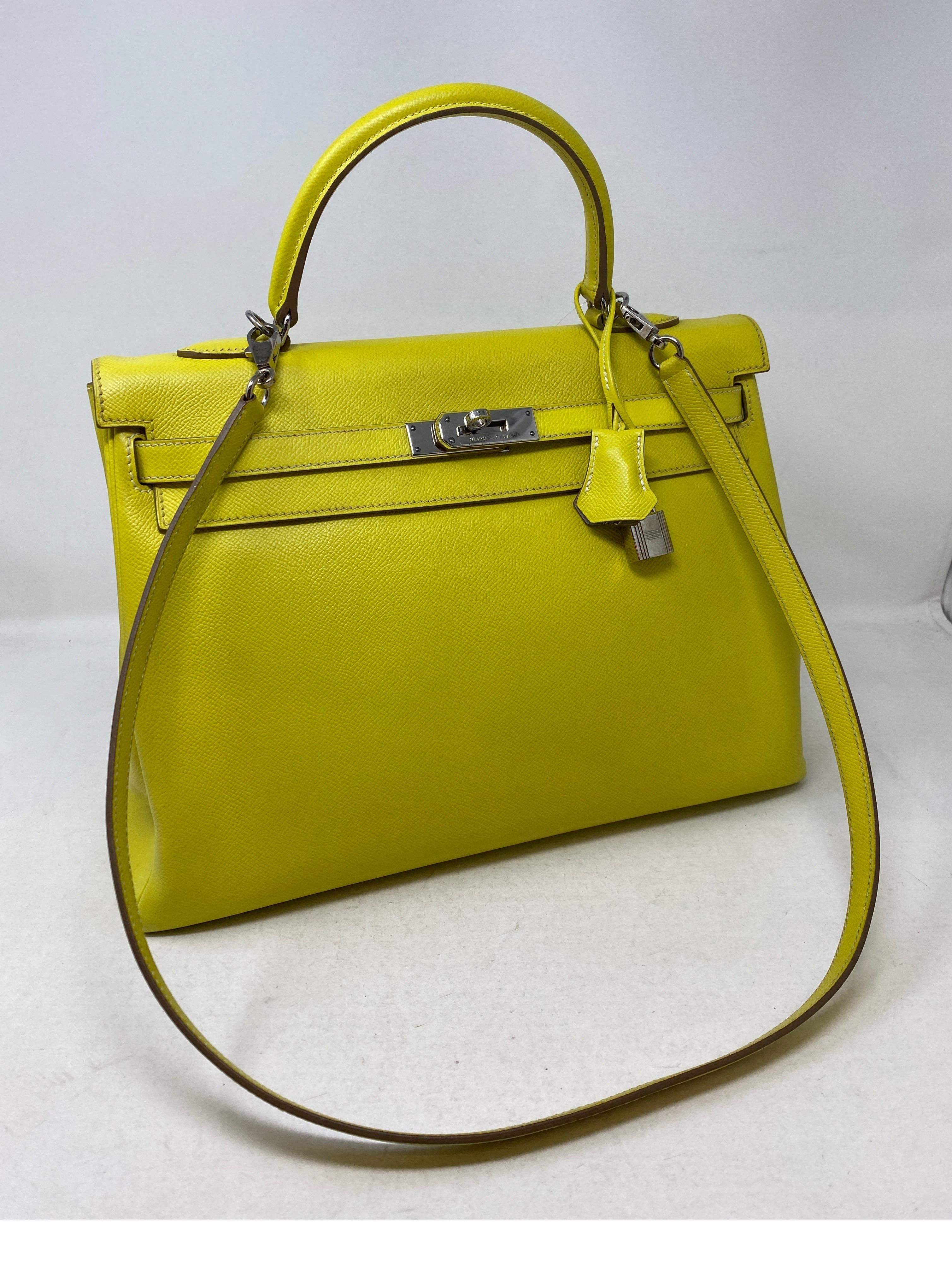 Hermes Yellow Kelly 35 Bag. Good condition. Candy limited edition. Interior light grey color. Exterior yellow bag. Includes clochette, lock, keys, and dust cover. Guaranteed authentic. 