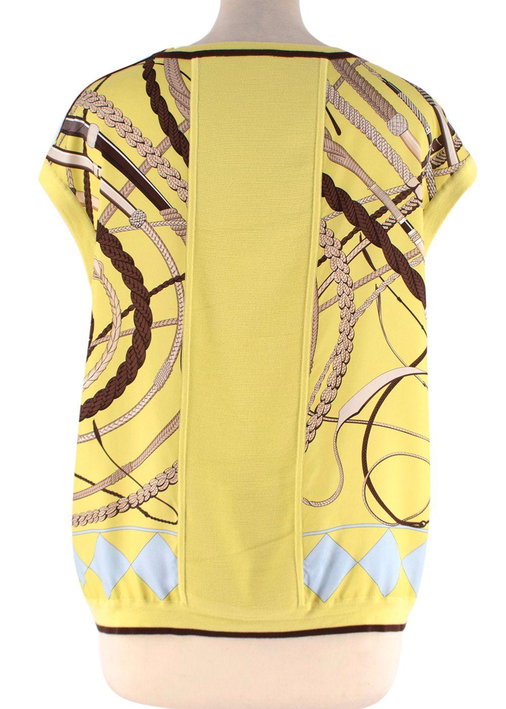 Hermes Yellow & Blue Equestrian Print Silk & Knit Vest

- Equestrian silk scarf pattern 
- Knitted collar, armholes, and hemline
- Insert knitted back panel
- Silver-tone metal exposed zip on the right shoulder

Item measured on flat surface, seam