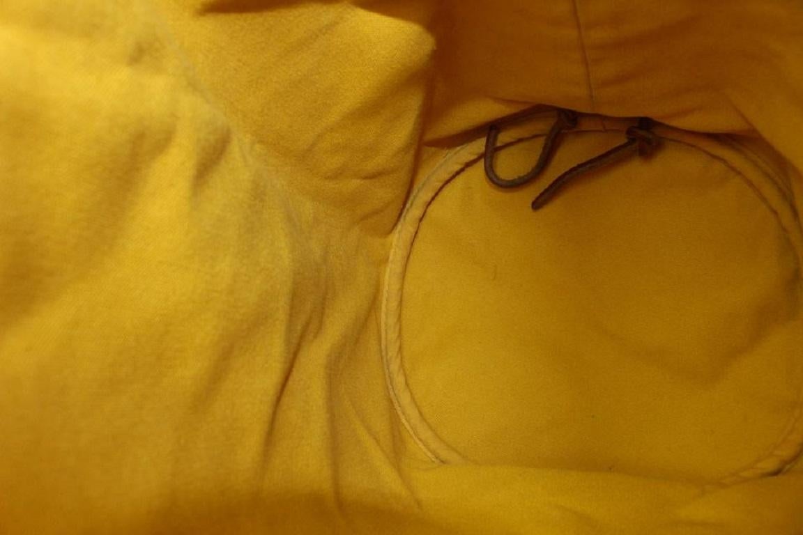 Jaune Hermès Sac à dos Polochon Mimile en toile jaune avec cordon de serrage 913her18 en vente