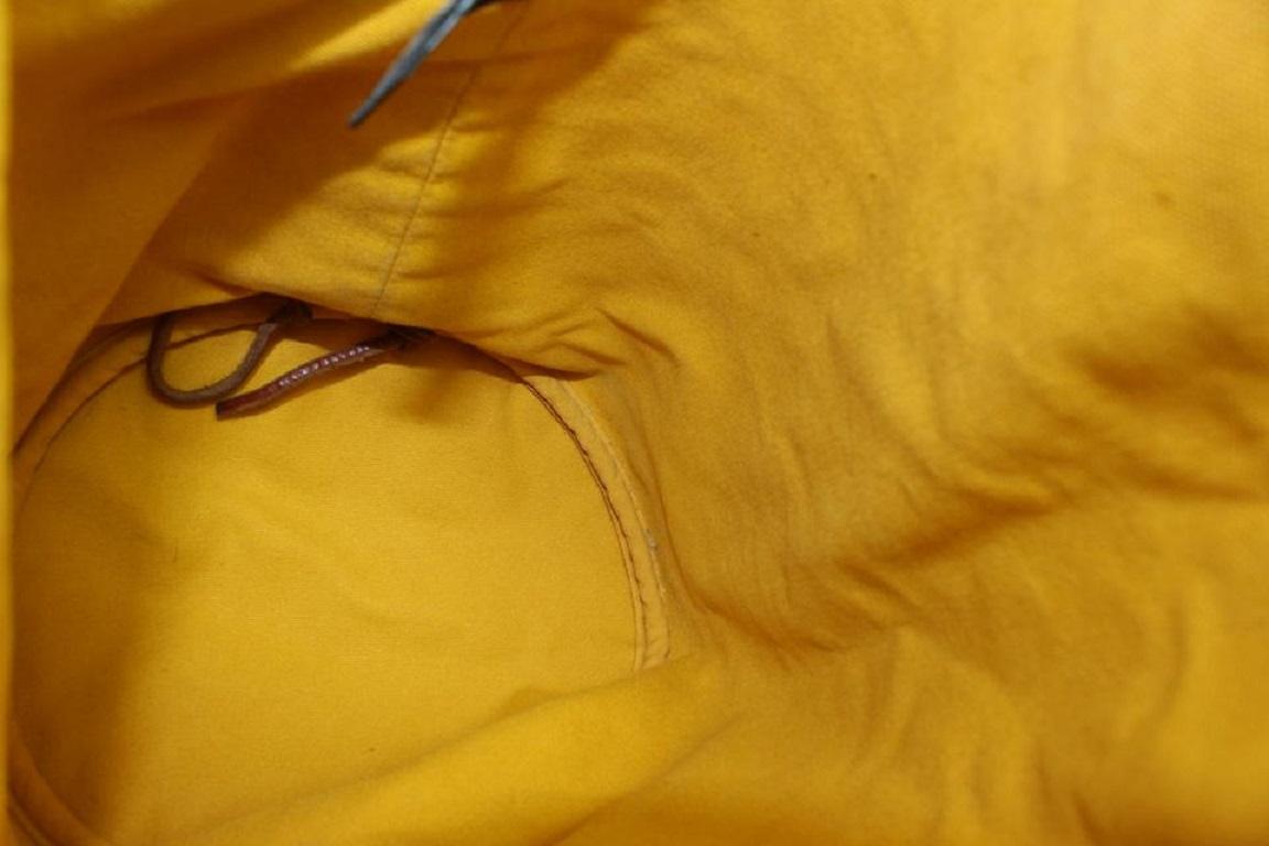 Hermès Sac à dos Polochon Mimile en toile jaune avec cordon de serrage 913her18 Bon état - En vente à Dix hills, NY