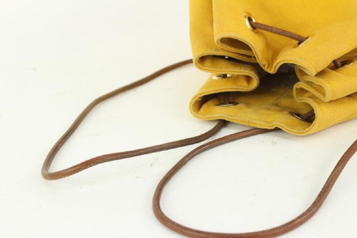Hermès Sac à dos Polochon Mimile en toile jaune avec cordon de serrage 913her18 Pour femmes en vente