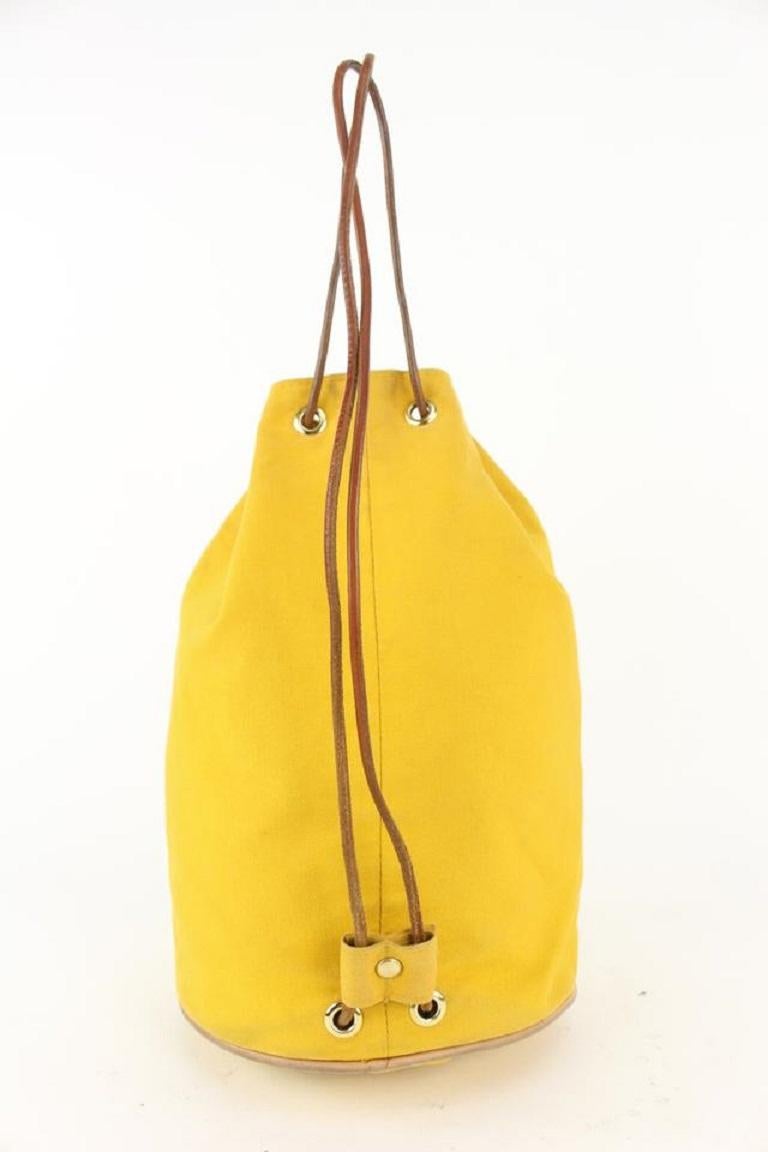 Women's Hermès Yellow Canvas Sac Polochon Mimile Drawstring Backpack 913her18 For Sale