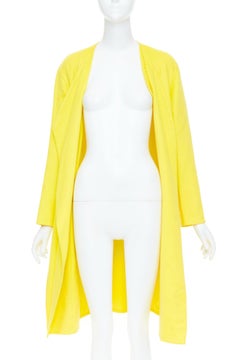 Manteau long minimaliste à col asymétrique en cachemire jaune HERMES, coupe cache-cœur, taille FR36 S
