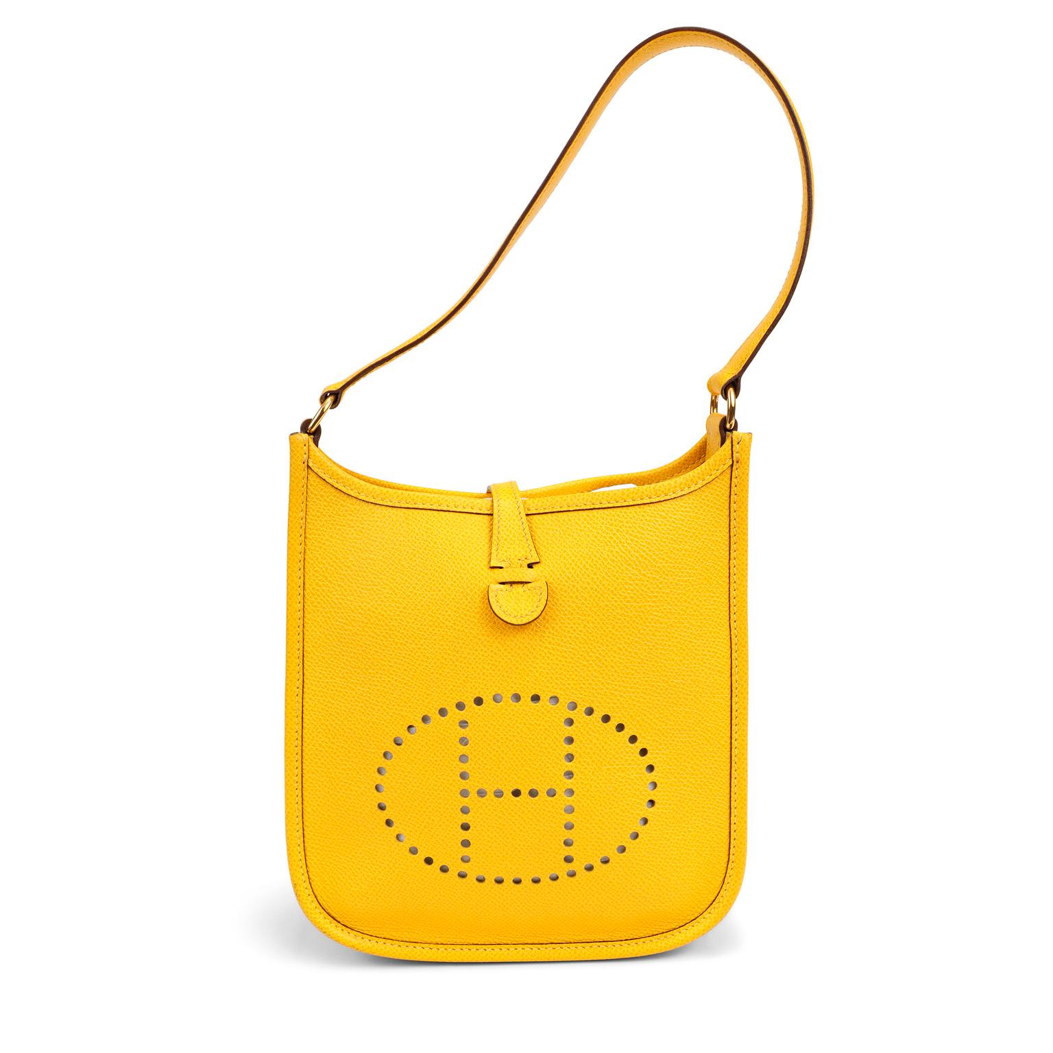 This authentic Hermès Yellow Epsom Evelyne TPM is in excellent condition. Extremely sought after, the Evelyne is an understated day bag that is stylish and practical.  The Mini is especially desirable in the current market. 
The Evelyne silhouette