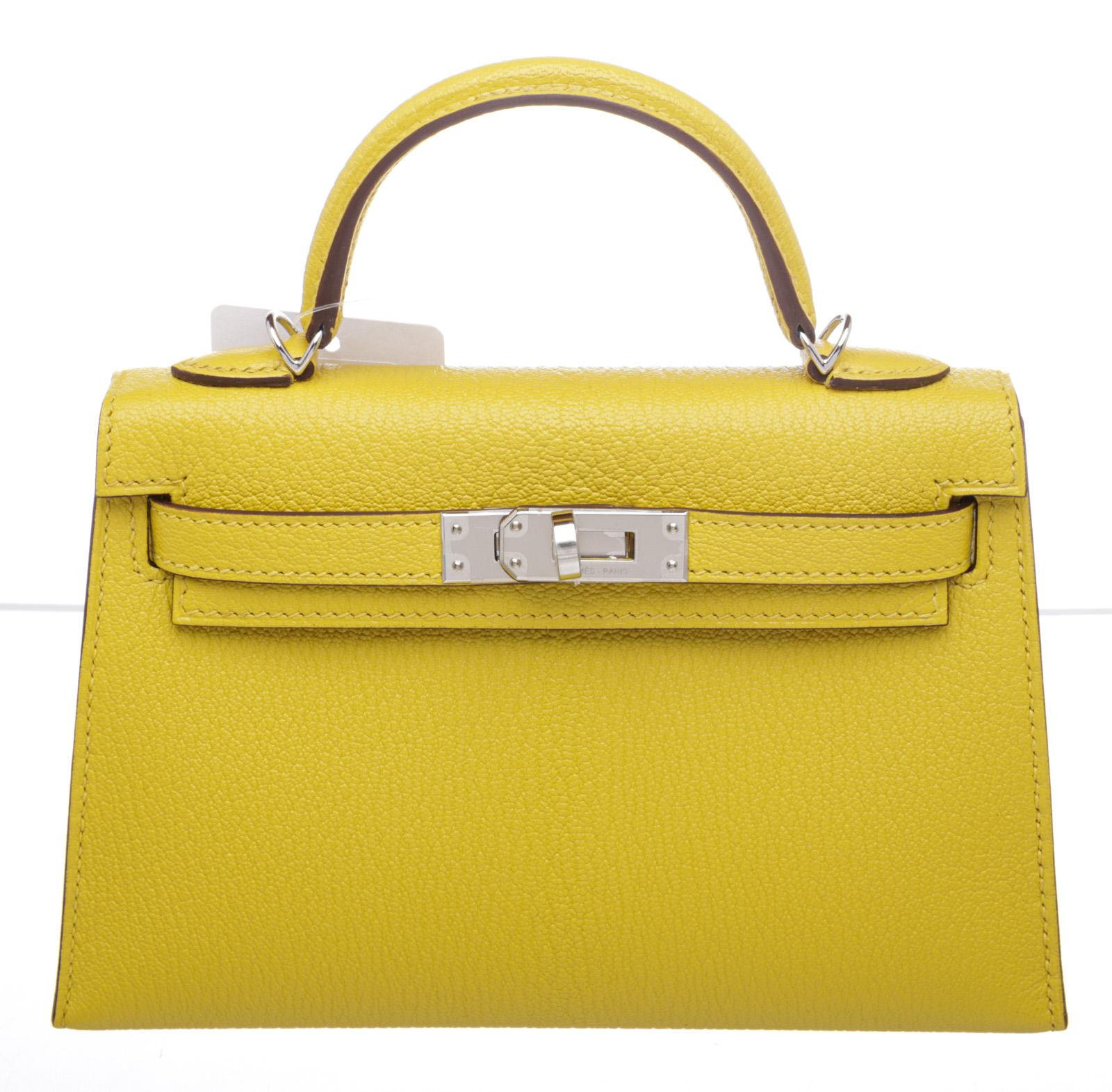 100% Authentic 

Sometimes you just need to be your own ray of sunshine. Crafted from Chevre leather in a bright yellow hue, this Kelly 20 2Way bag from Hermes will brighten up even the darkest of days. Rise and shine. The Kelly features a single
