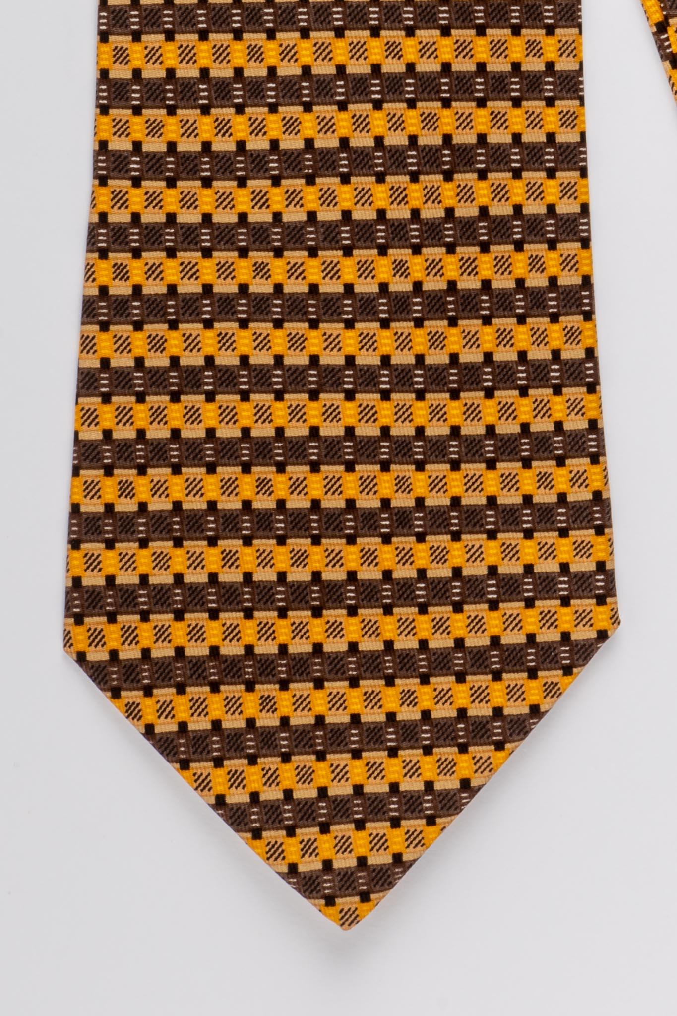 Hermes yellow and etoupe silk geometric tie. Excellent condition.