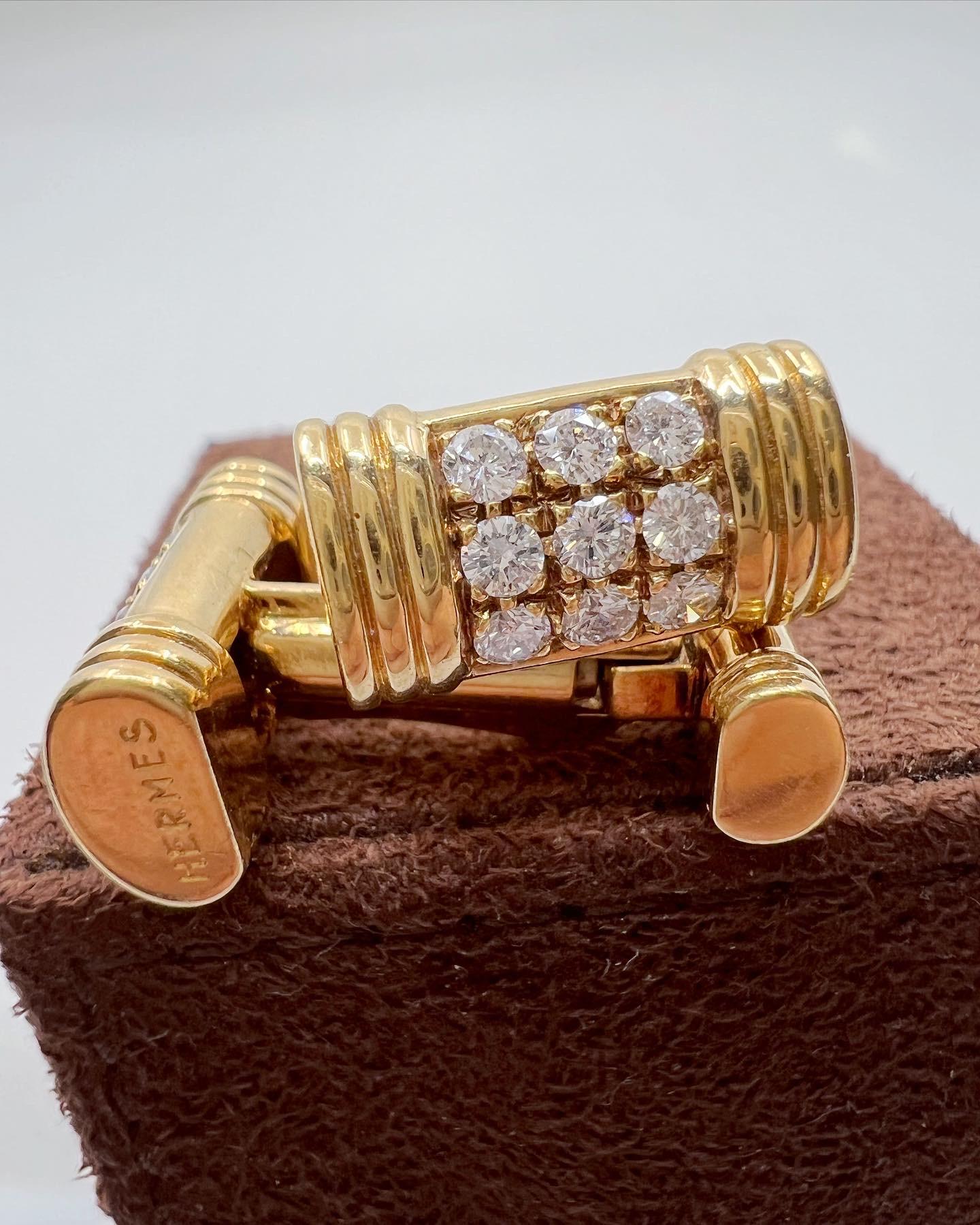 Cufflinks in yellow gold (18K), the center part set with 9 diamonds. 
Signed and numbered. 
Comes with original Hermès box. 
Year : 70'
Weight : 13,7 grams