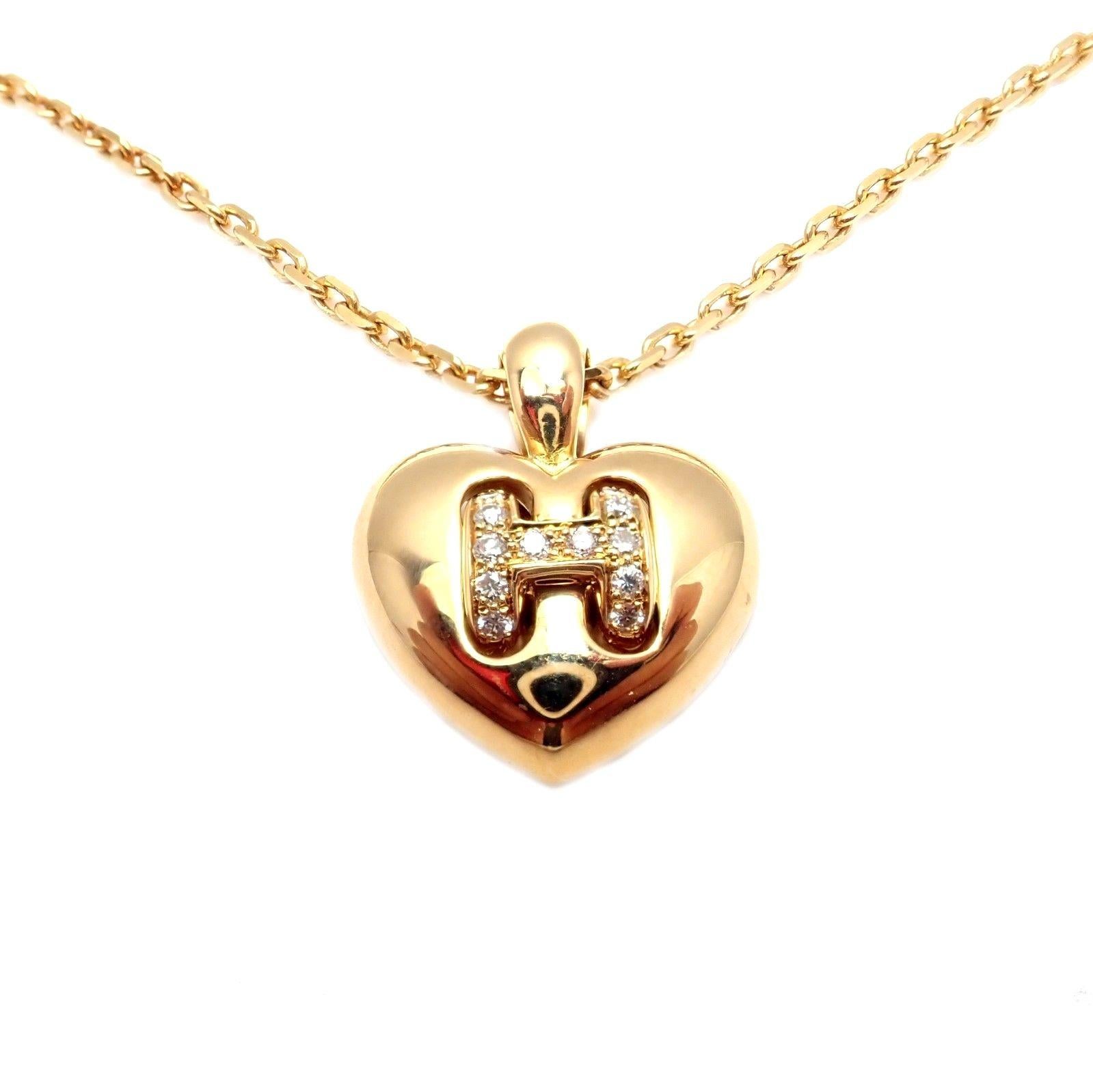 18k Yellow Gold Diamond H Heart Pendant Necklace by Hermes. 
With 12 Round Brilliant Cut Diamonds, VS1 Clarity, G Color. Total Diamond Weight: .25CT. 
Details: 
Length: 15