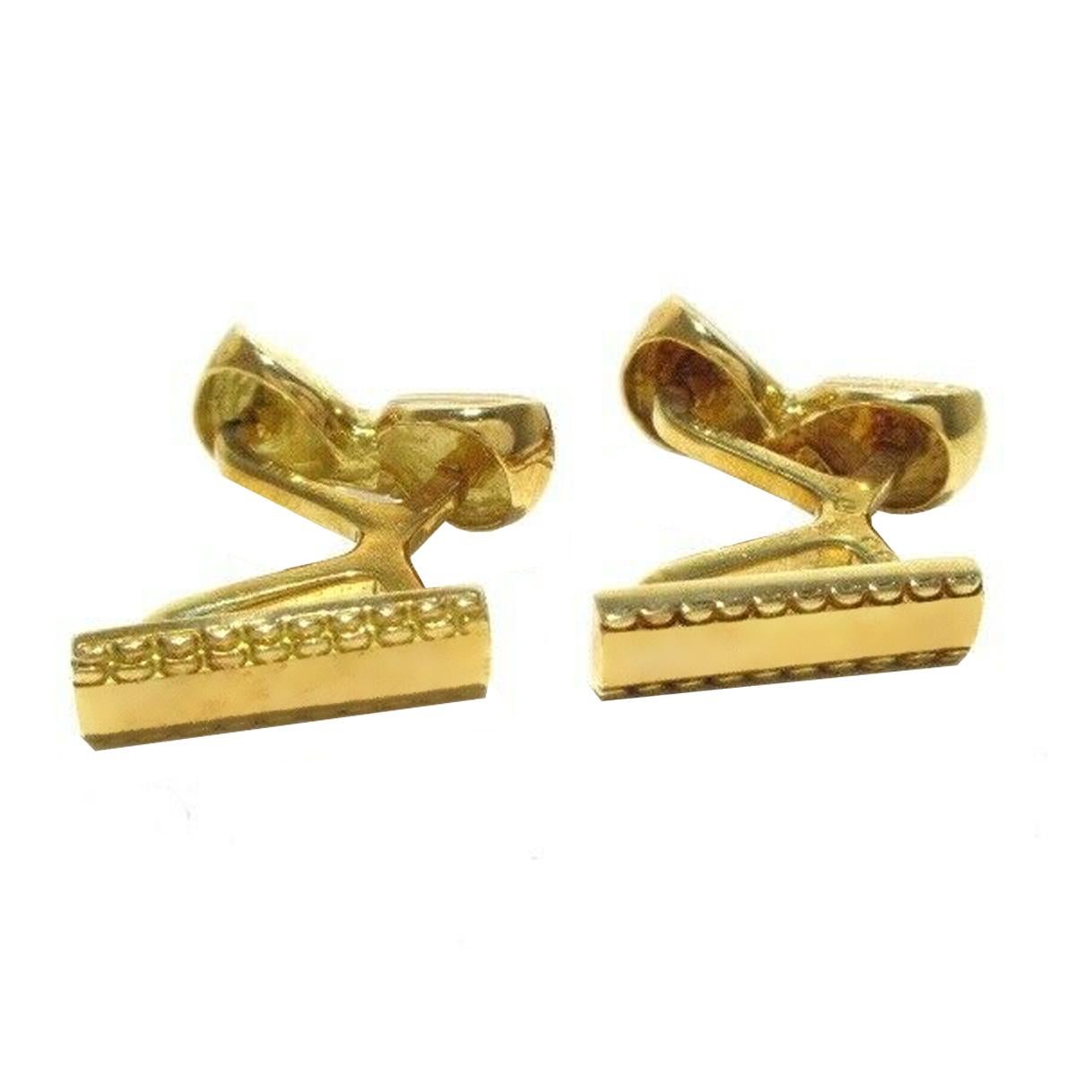 A fabulous pair of Hermes Paris yellow gold cuff links crafted in 18k yellow gold. The cuff links have a weight of 15.8 grams.