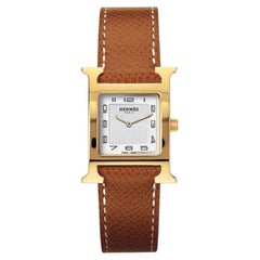 Antique Hermès Yellow-Gold Plated Steel Watch with Sunburst Stamped Motif