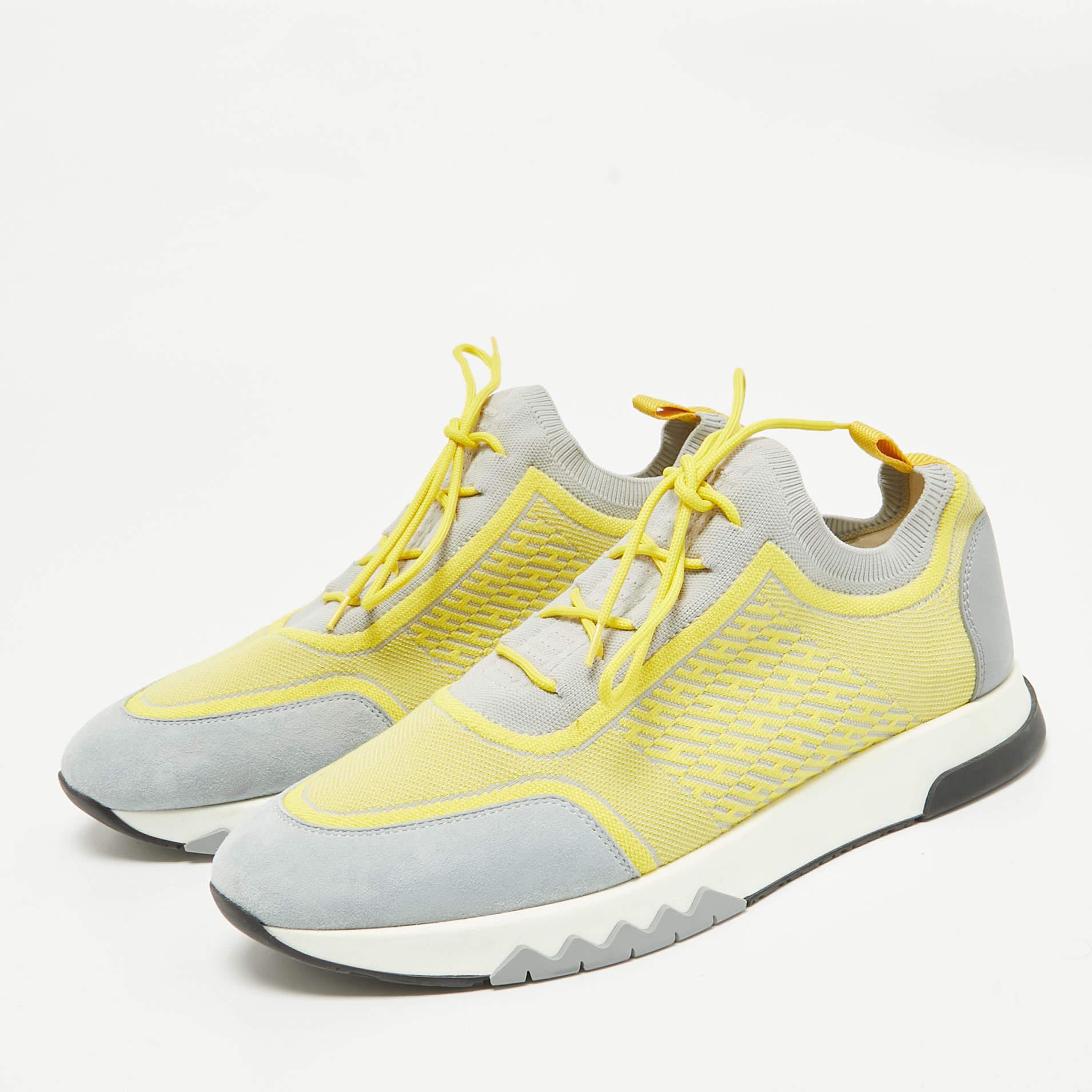 Coming in a classic silhouette these designer sneakers are a seamless combination of luxury comfort and style. These sneakers are finished with signature details and comfortable insoles.