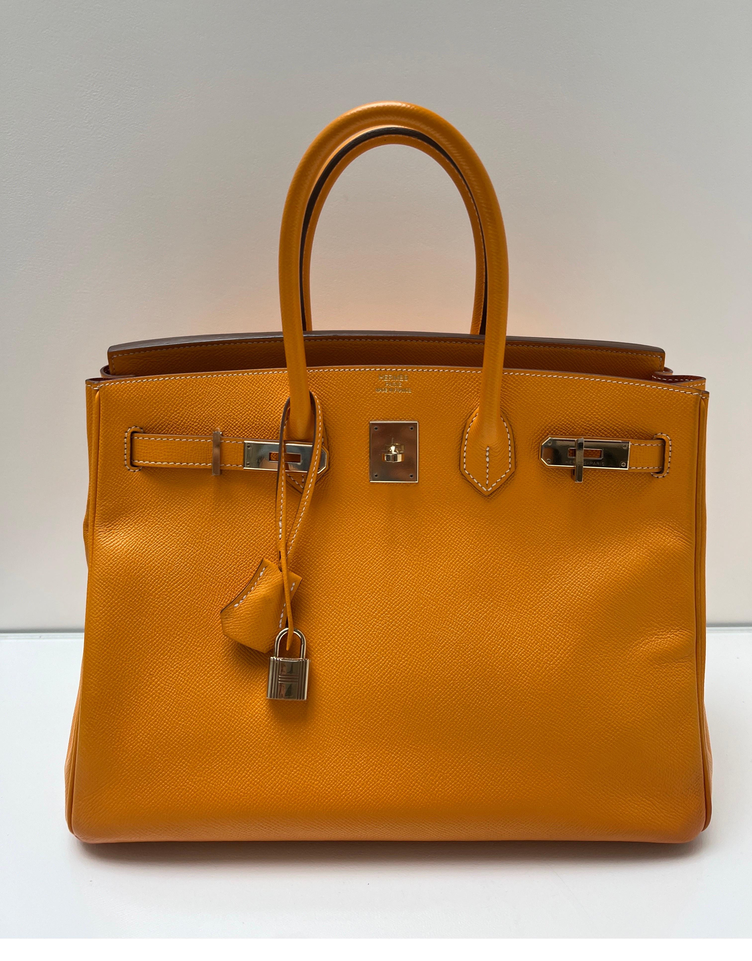 Hermes Jaune Candy Birkin 35 Bag. Rare yellow Birkin with different interior color. Candy collection. In good condition. Plastic is still on the hardware. Epsom leather. Palladium hardware. Contrast white stitching. interior clean. Exterior very