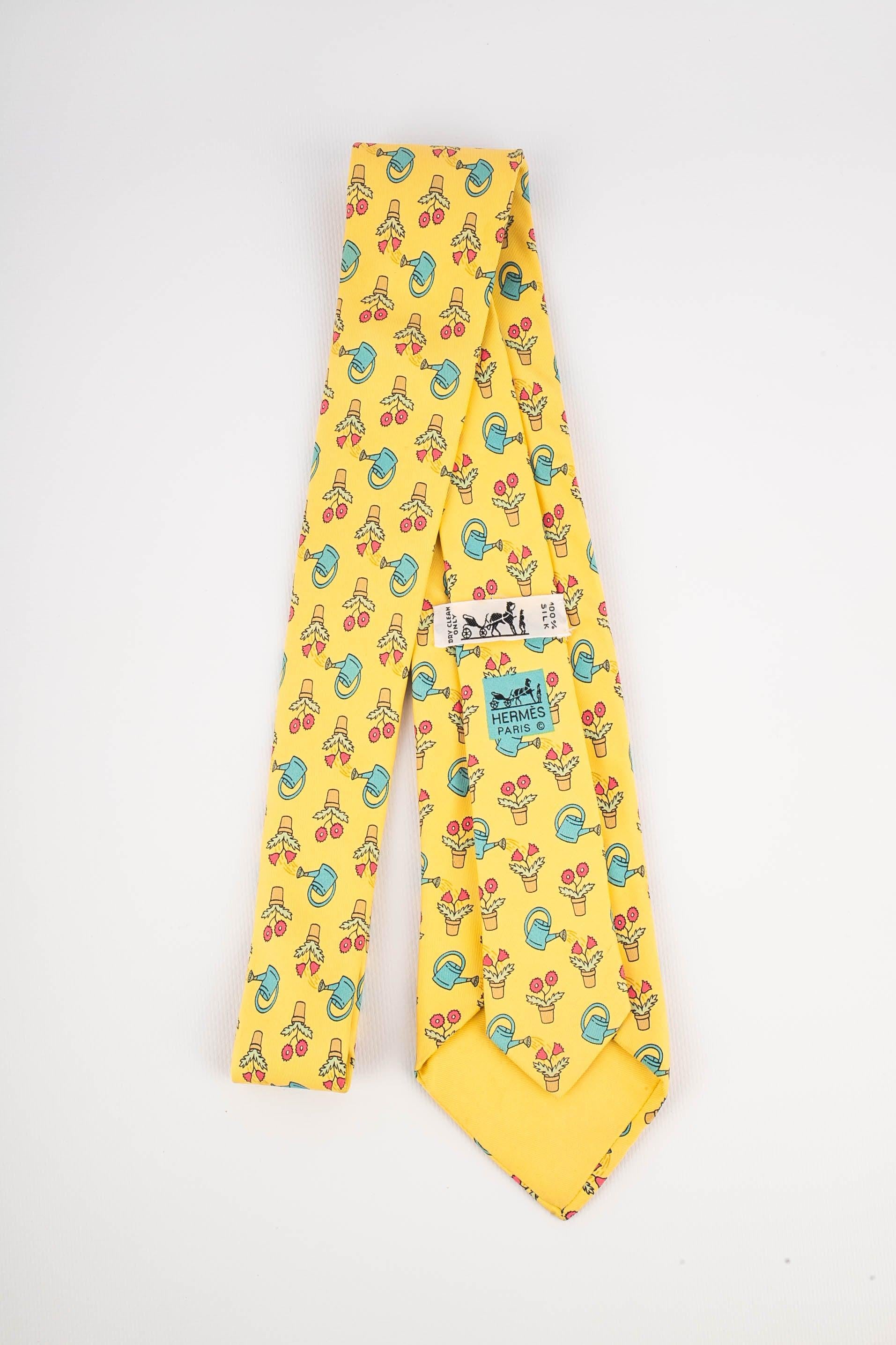 Hermès Yellow Silk Tie Illustrated with Flowers and Watering Cans For Sale 1