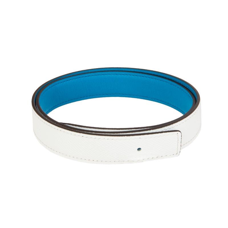 Hermes 24mm reversible belt strap in Bleu Zanzibar (bright blue) Veau Swift and Blanc Veau Epsom leather. Brand new. Comes with box.

Size 75
Width 2.4cm (0.9in)
Fits 73cm (28.5in) to 77cm (30in)