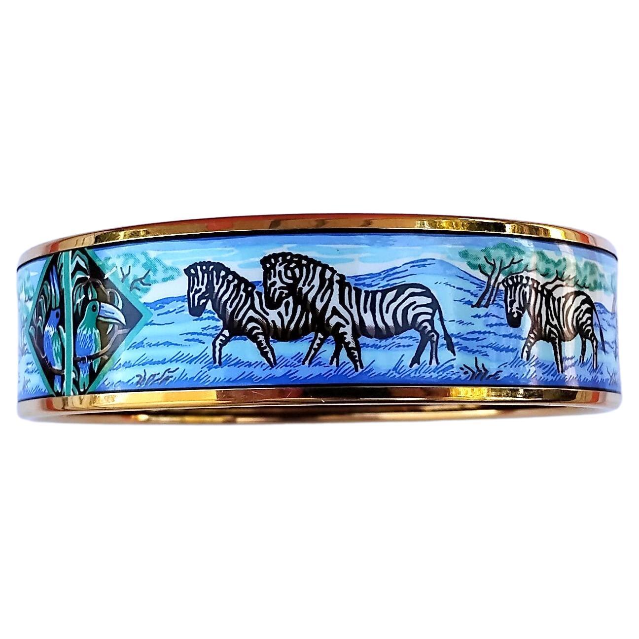 Rare and Coveted Authentic Hermès Bracelet

Print: Zebras and Toucans in Savannah

Pattern inspired from the scarf called 