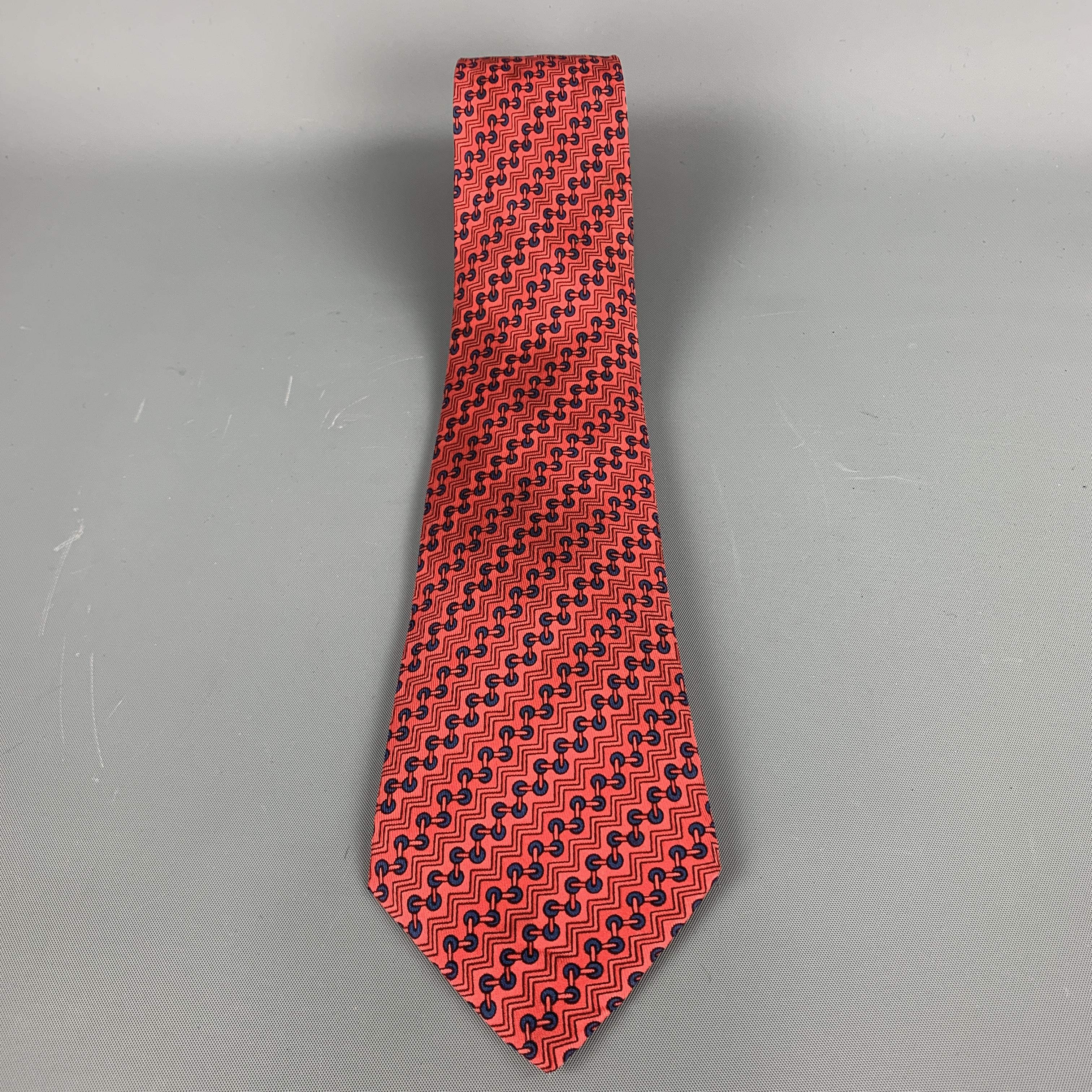 Vintage Hermes necktie comes in red silk twill with all over 