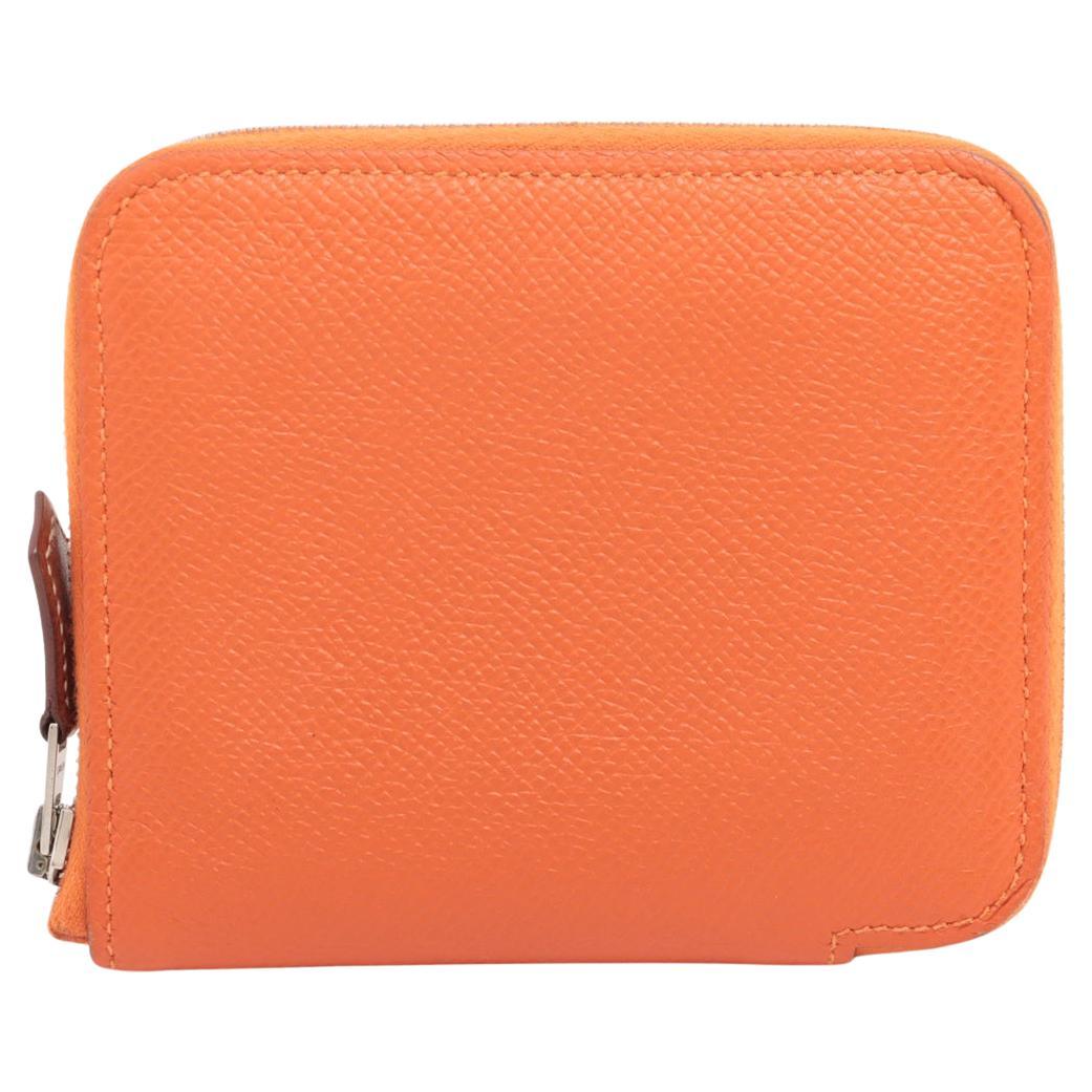 Hermès Porte-monnaie compact à fermeture éclair Orange en vente
